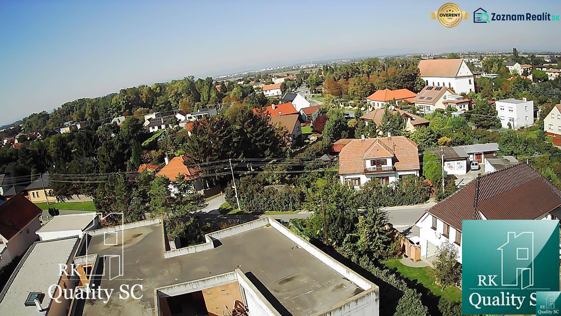A view of a family house in Kráľová pri Senci on Záhumenská Street with surrounding greenery.