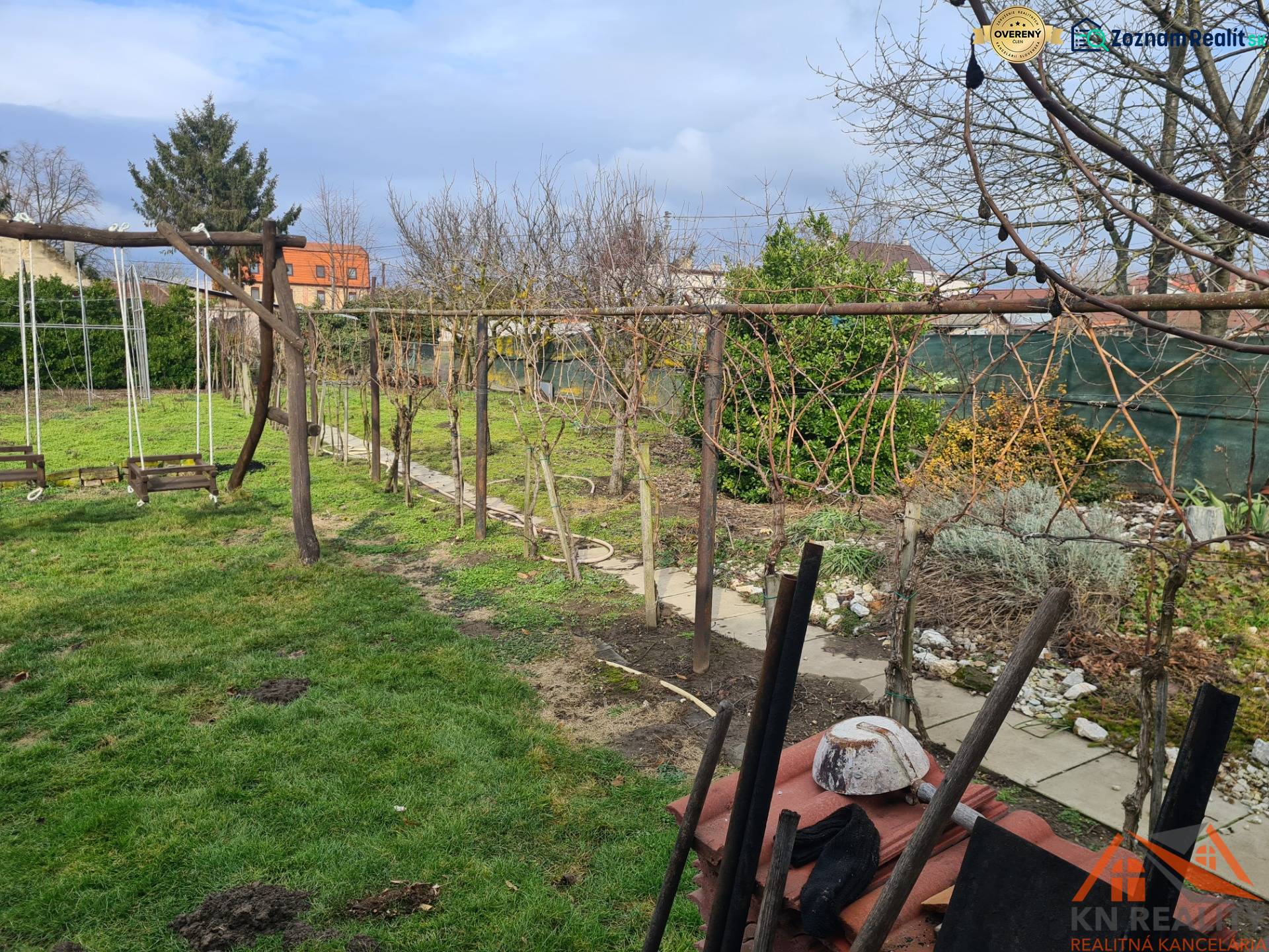 Garden in Saint Peter with structures for vines and wooden swings. Plots - housing.