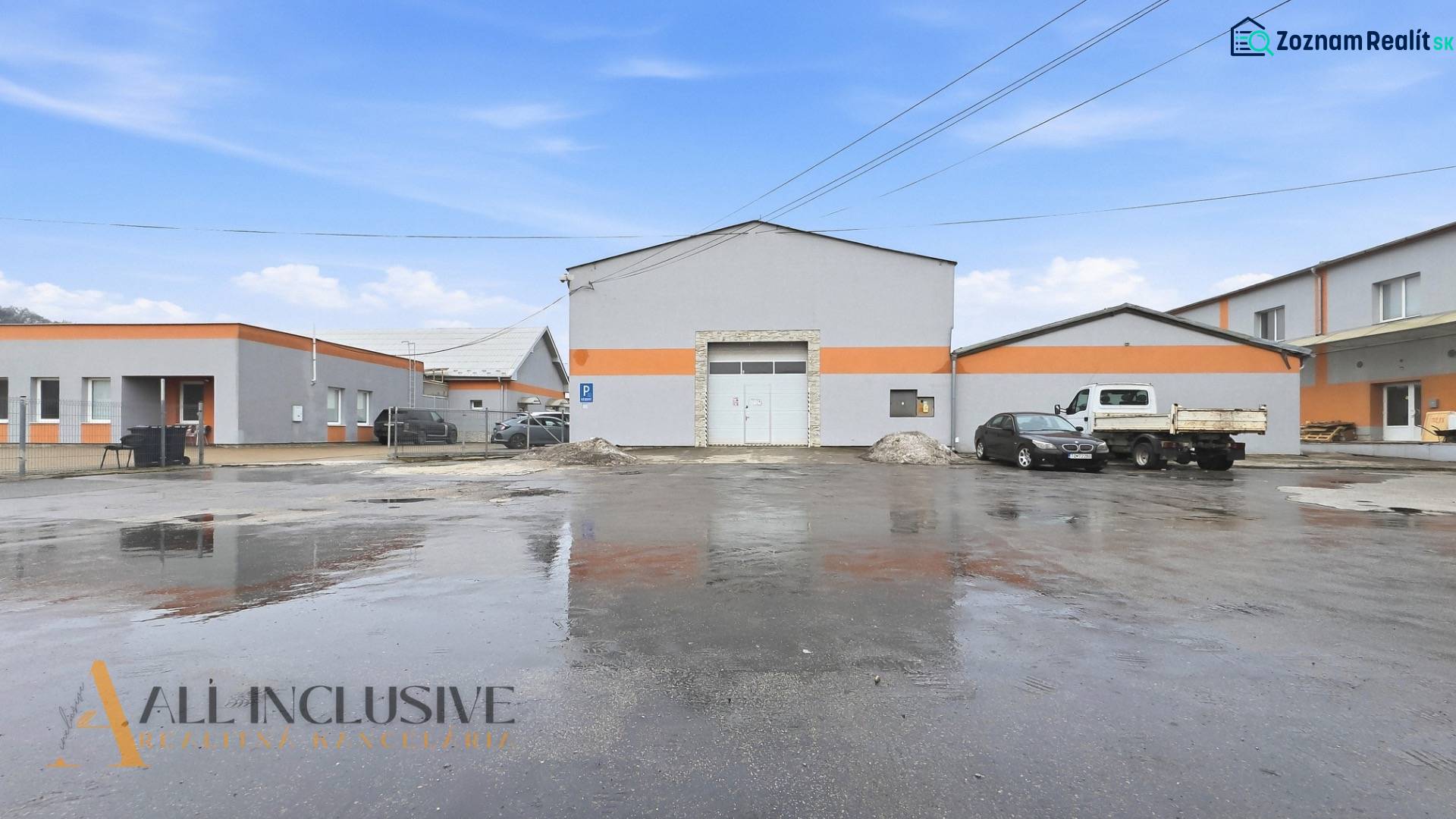 The exterior of commercial premises on Pod kalváriou Street in Topoľčany with parked cars.