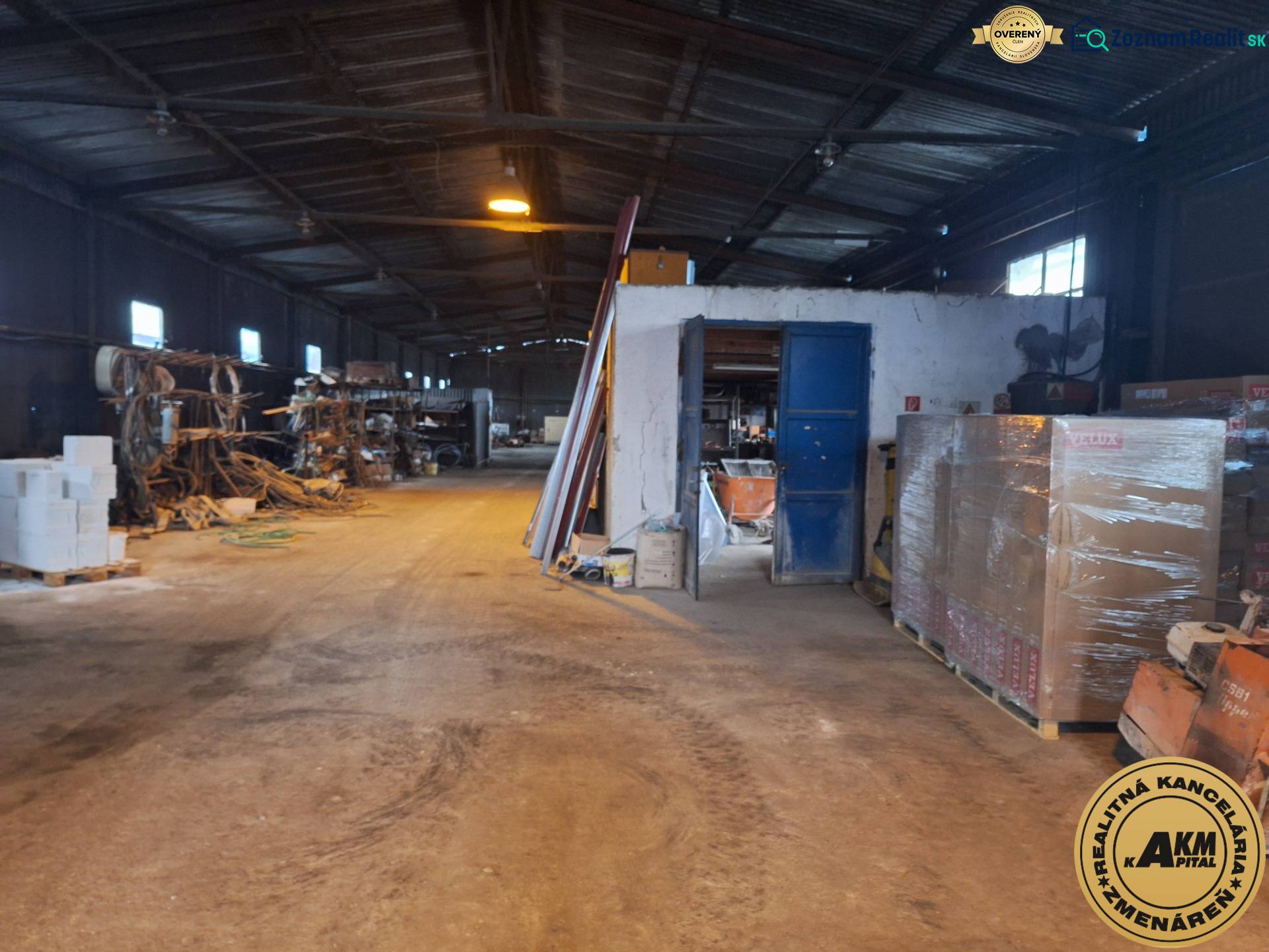 Interior of the warehouse with stored materials and equipment on Lieskovská cesta in Zvolen.