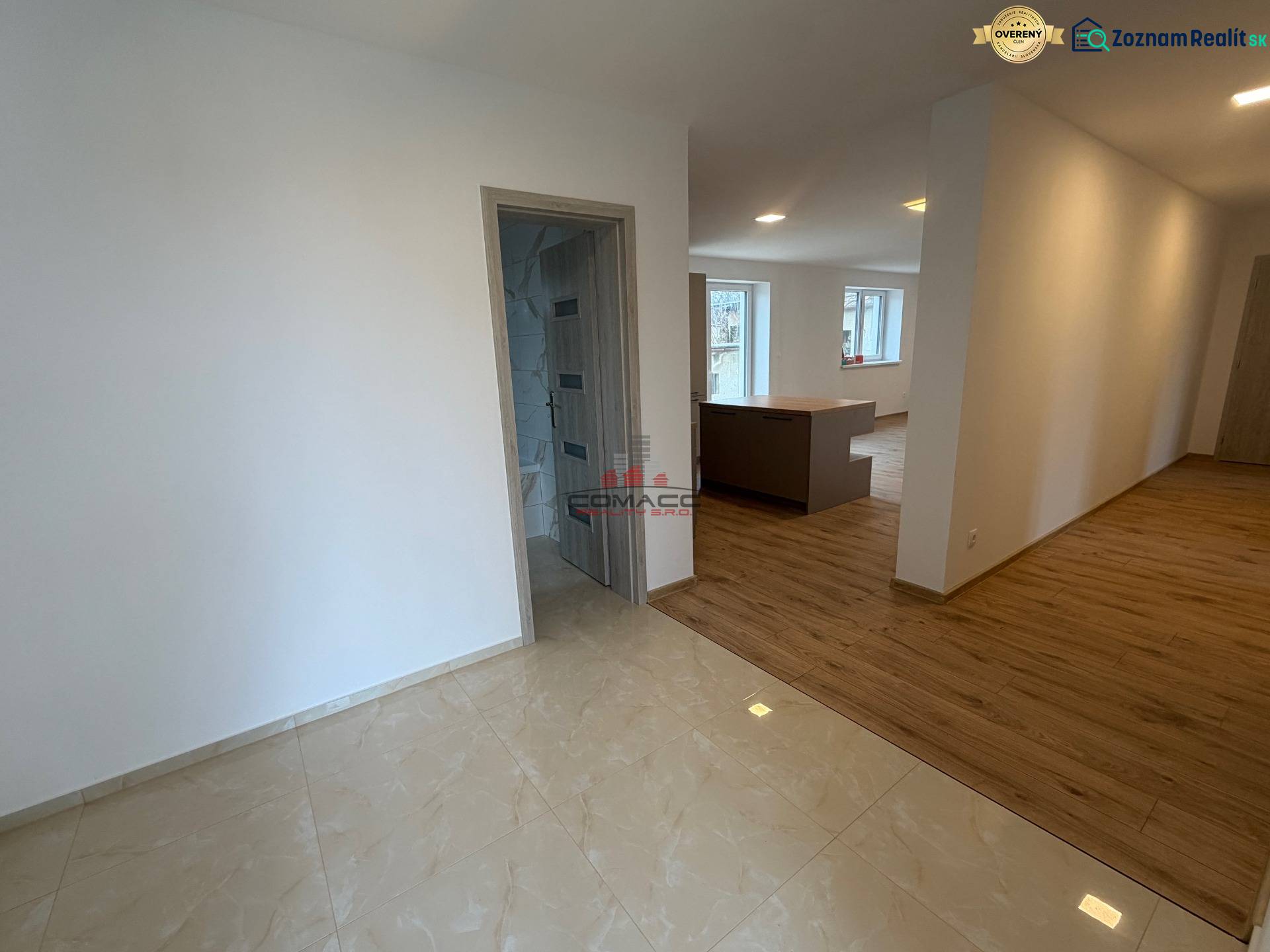 Interior of a family house with a wooden decor floor and light walls.