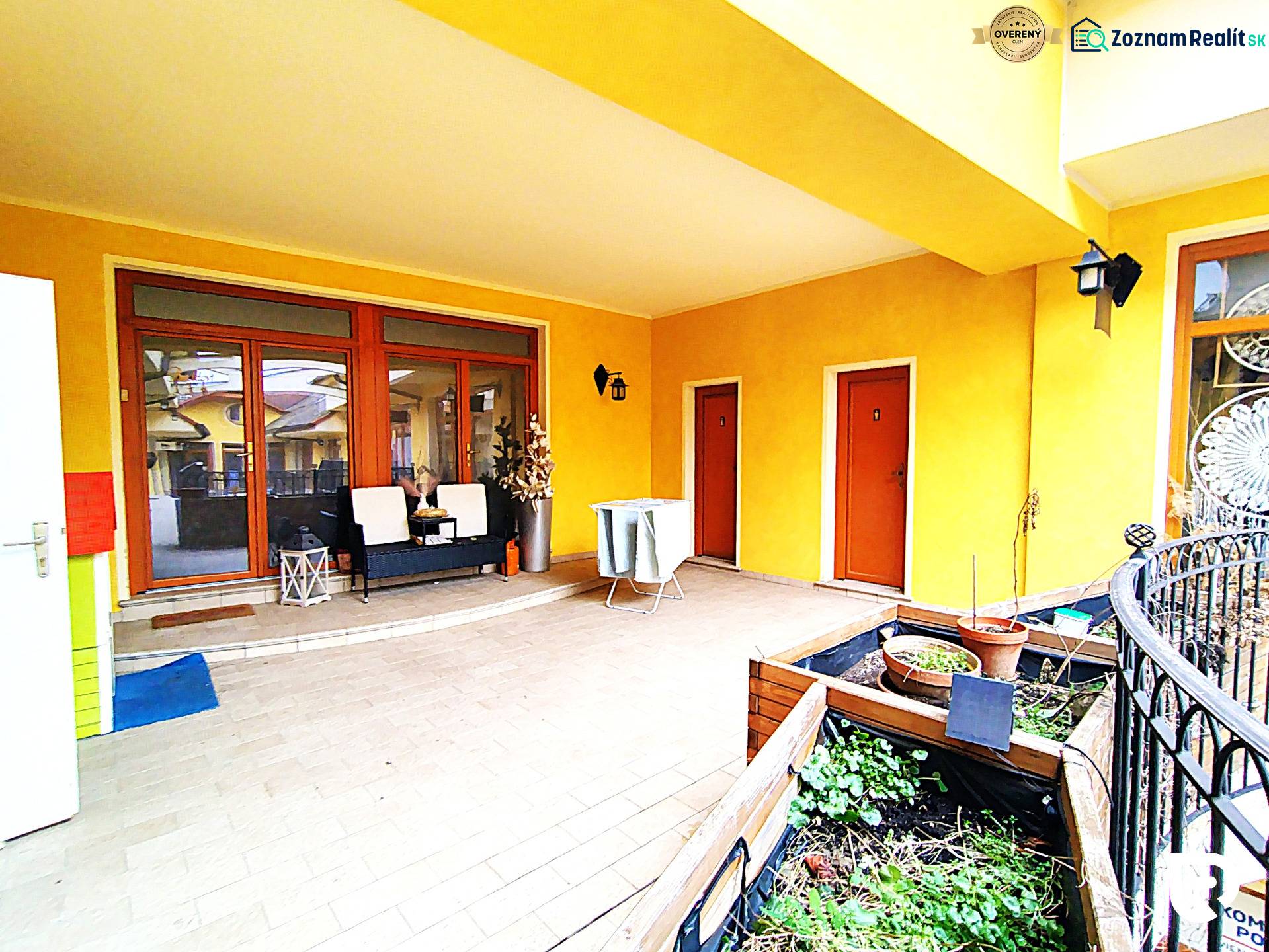 Terrace at a 2-room apartment on Potočná Street in Skalica with plants and seating.