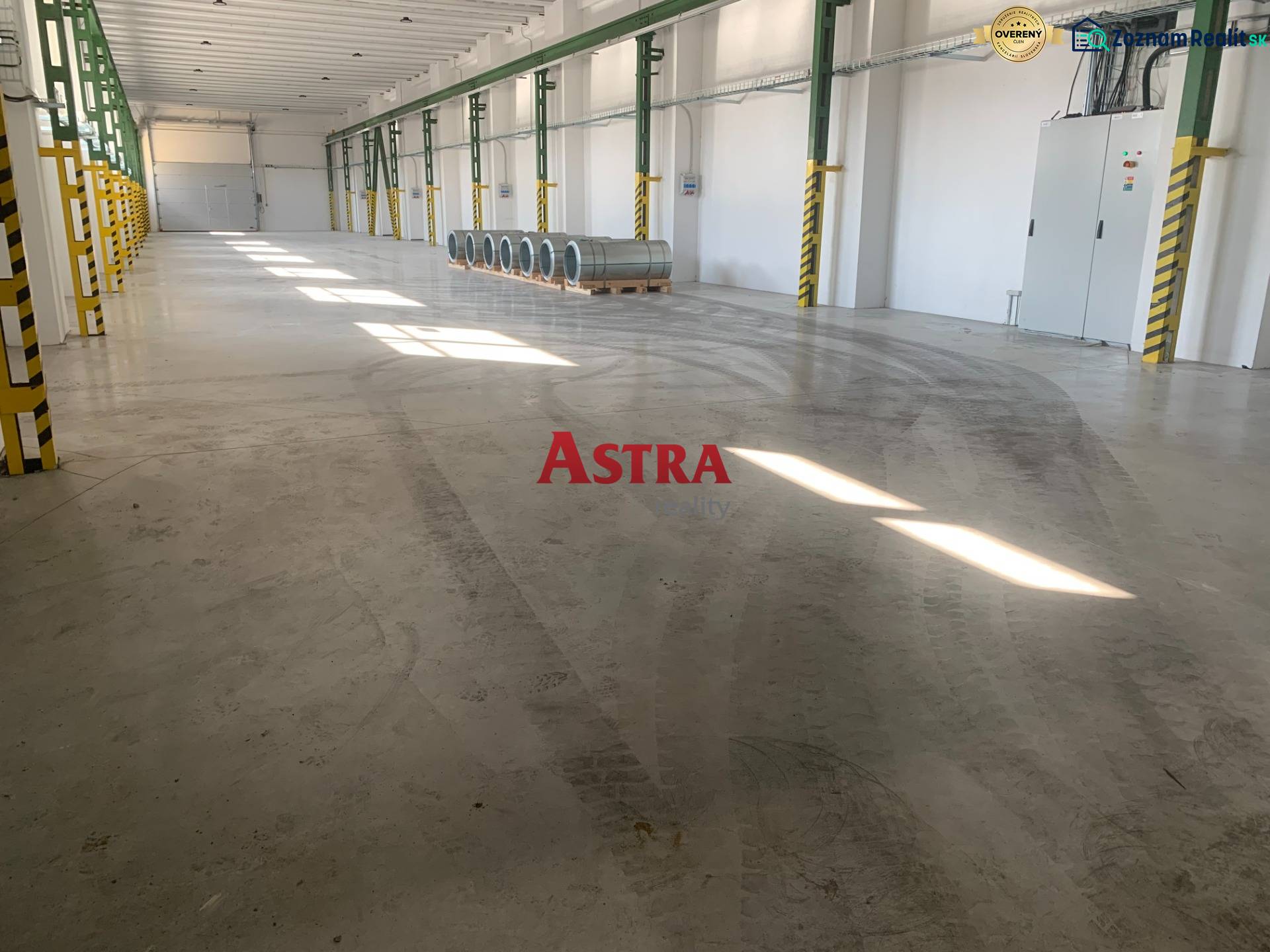 Spacious interior with storage spaces and steel barrels, Warehouses and halls.