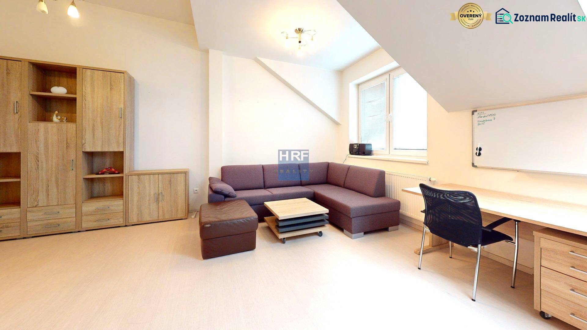 Offices with a sofa, desk, and cabinet, floor with wood decor.