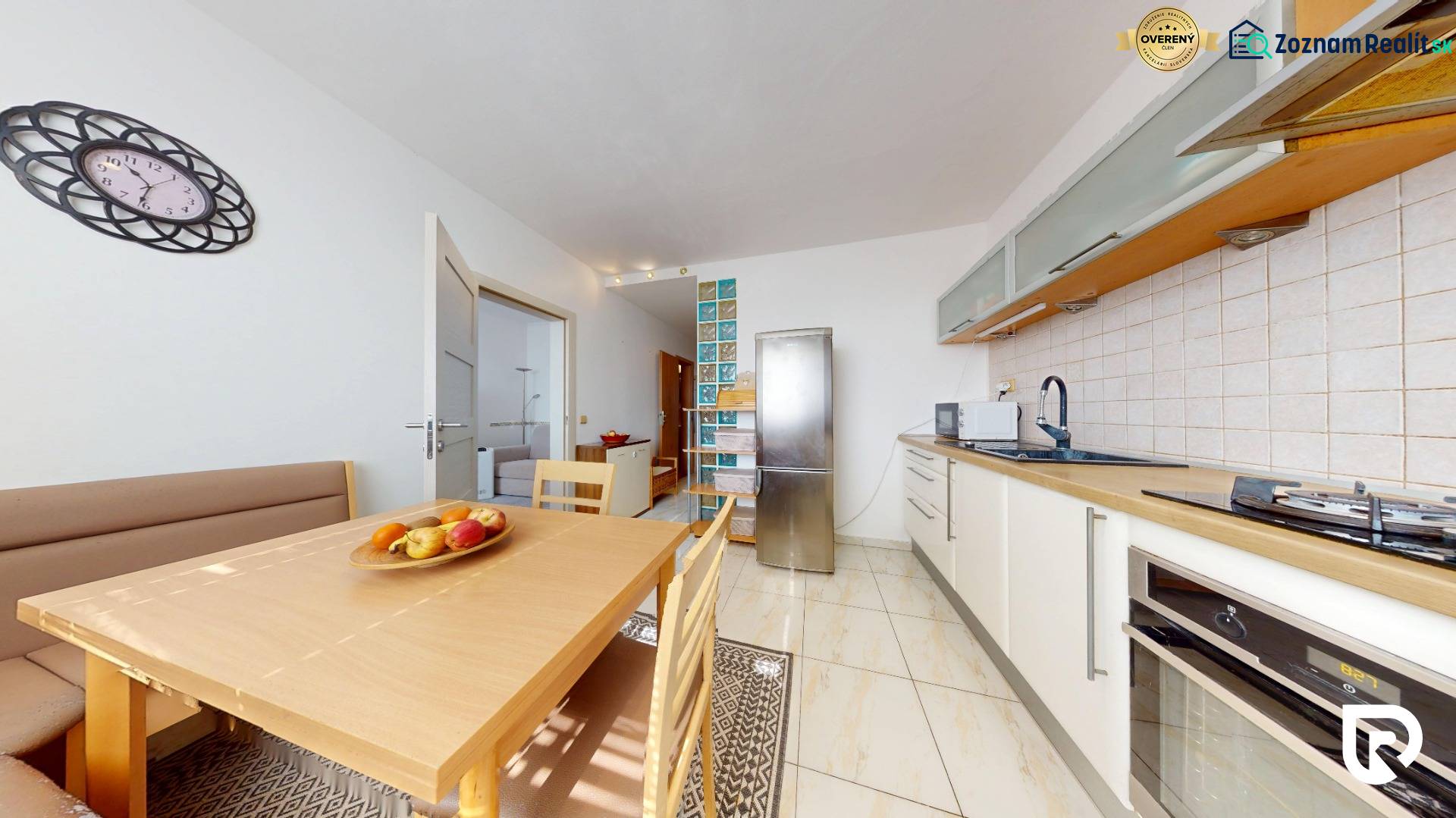Kitchen in a 4-room apartment with a dining table and kitchen unit.