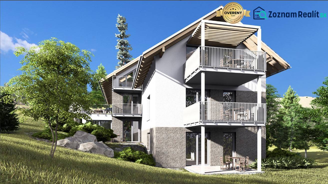 The exterior of an apartment building in the High Tatras with a garden and spacious balconies.