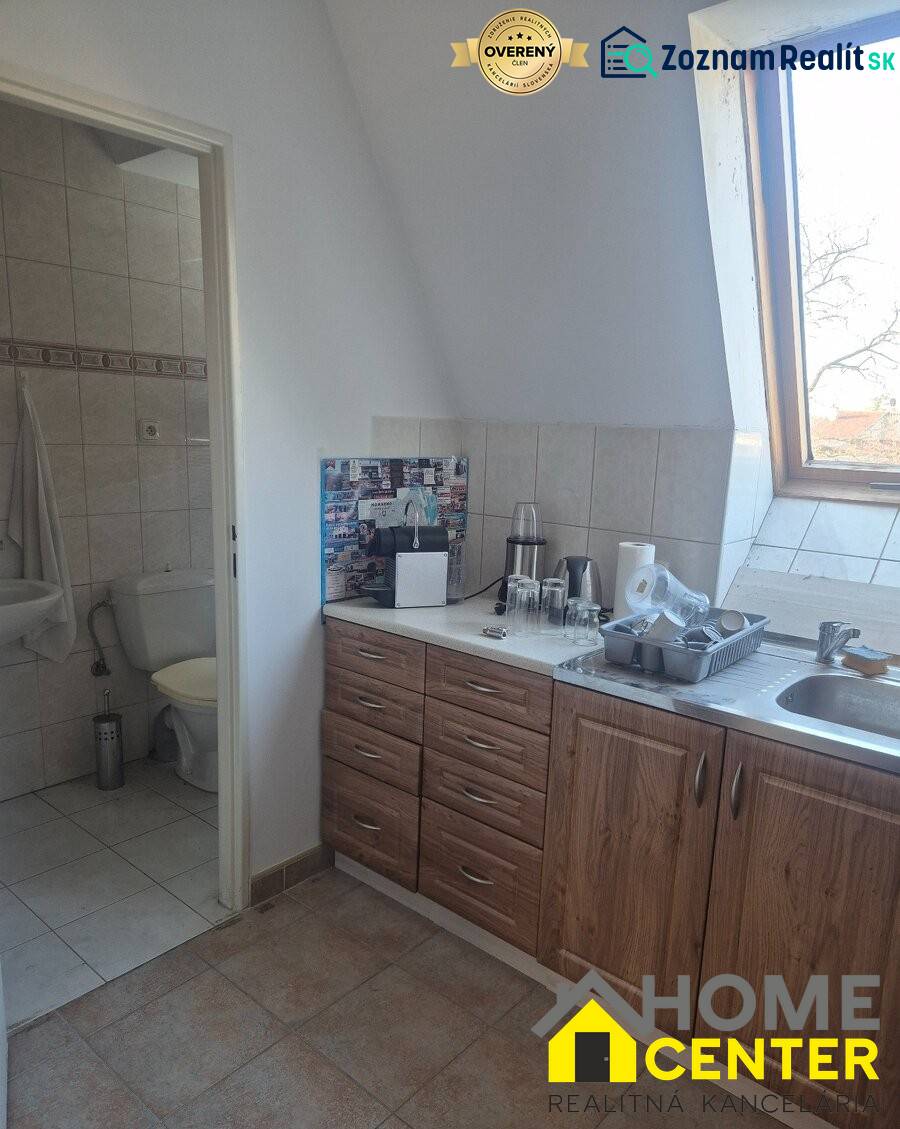 Kitchen corner with wood decor, toilet, interior of commercial premises.