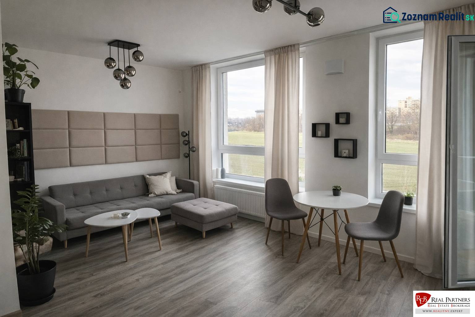 Living room with a sofa, tables, and a wooden decor floor in a 2-room apartment.