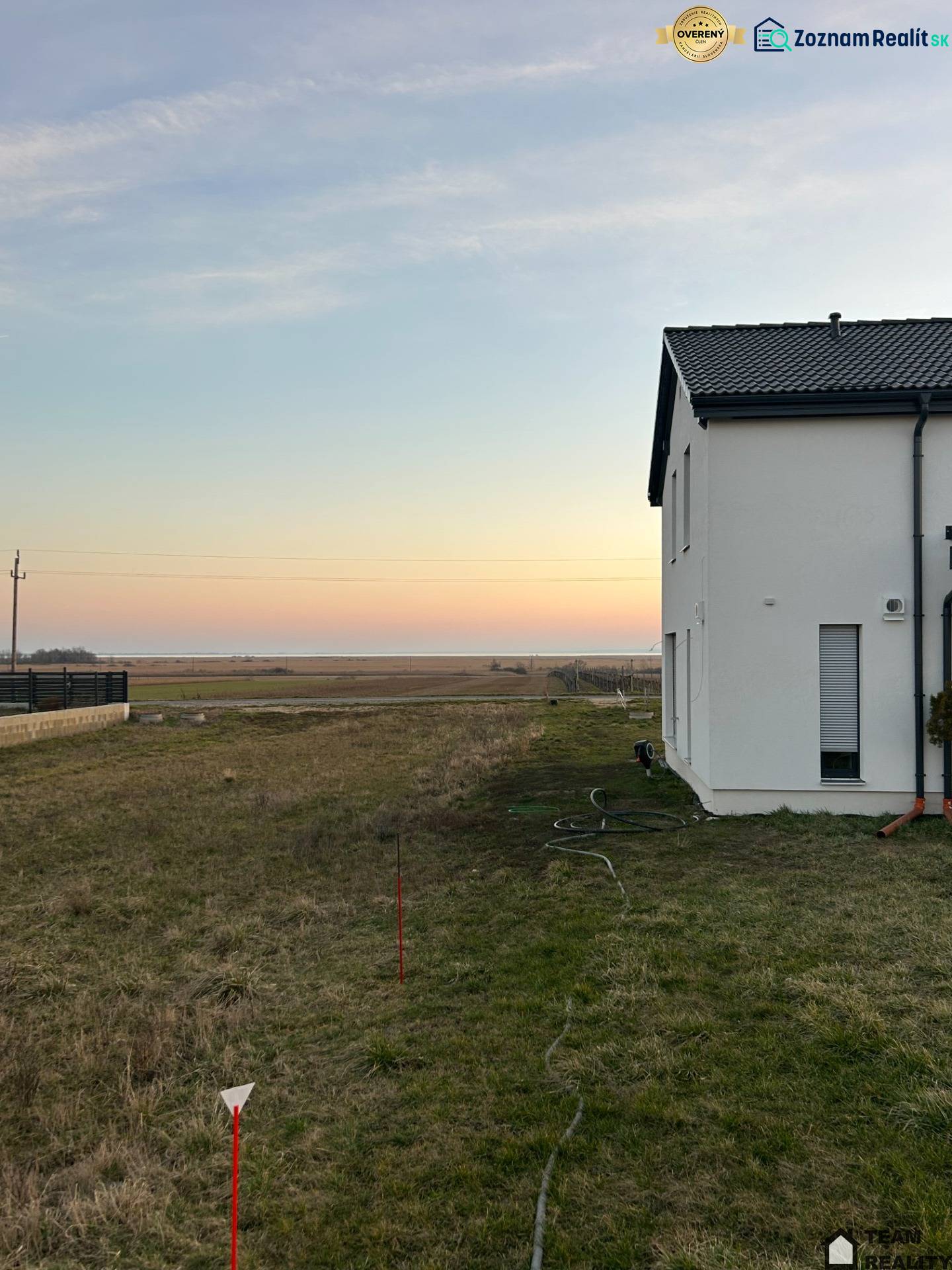 White house at sunset on the grounds - living in Neusiedl am See.