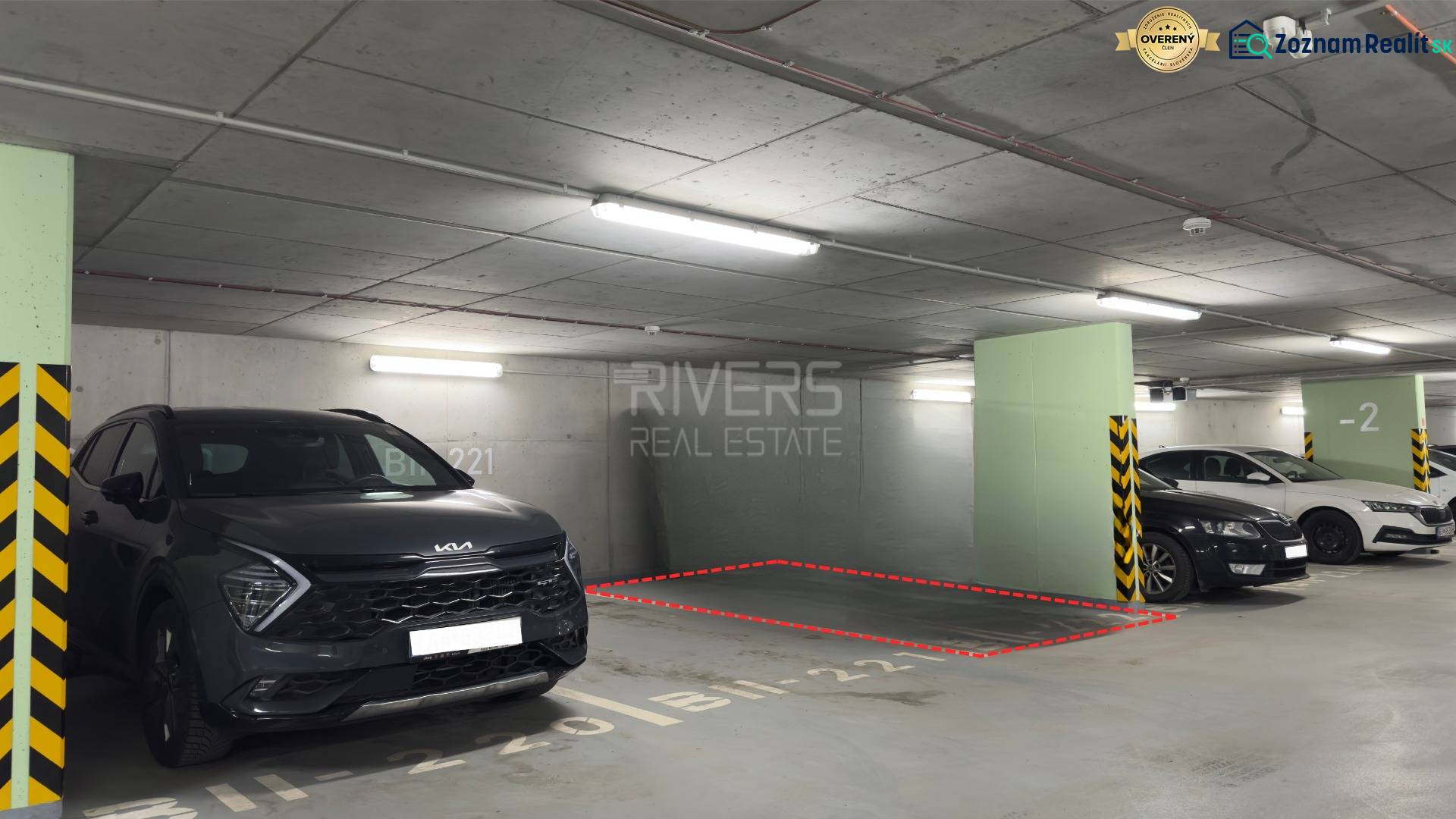 Parking space between vehicles in the garage on Račianska Street 26 F in Bratislava.