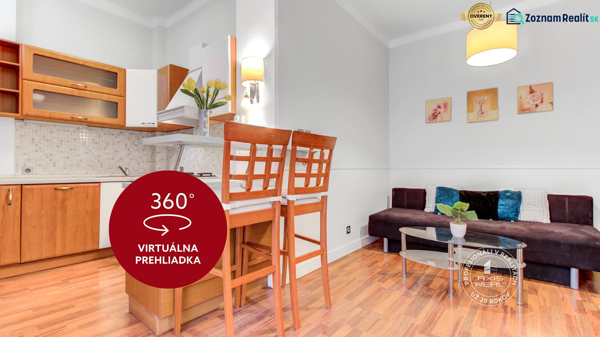 A kitchen with a seating area in a 4-room apartment with a wood-patterned floor.