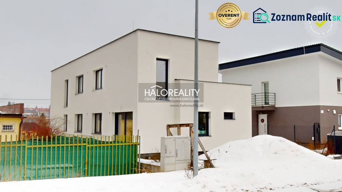 Snow cover at the offices in Poprad with regard to the architecture of the buildings.