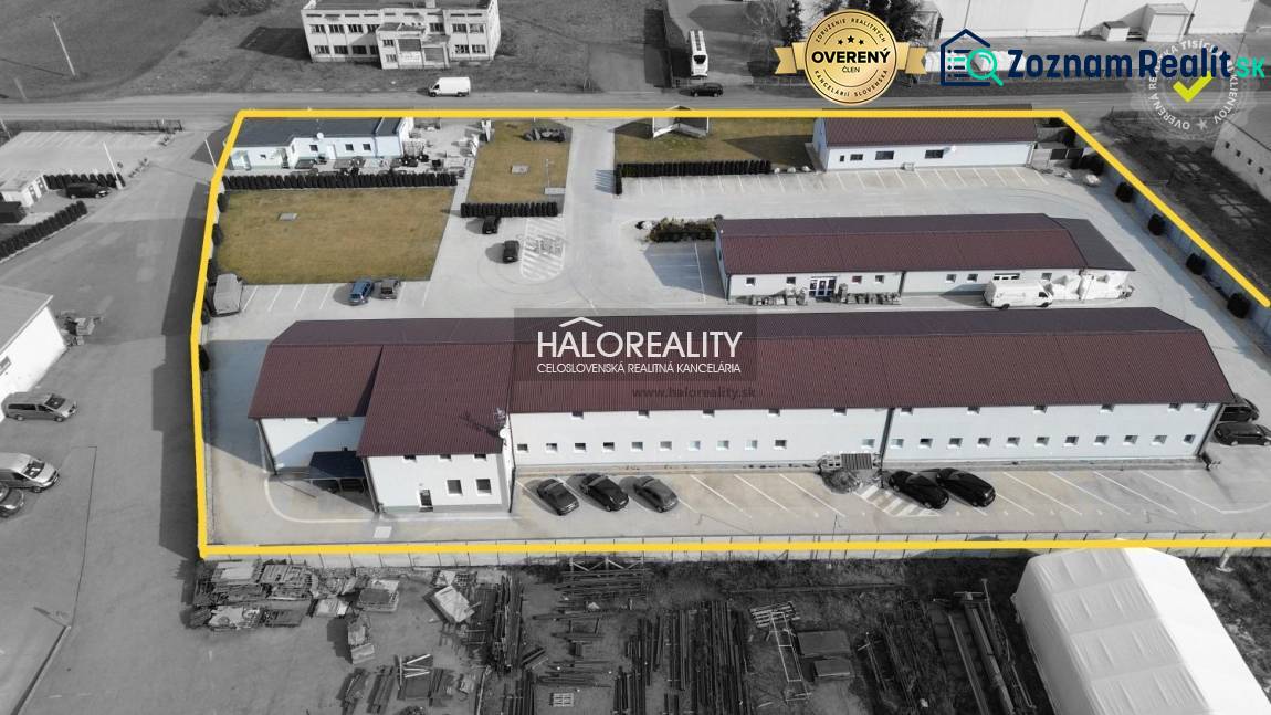 An industrial complex with warehouses, offices, and parking offers commercial spaces in a quiet area.