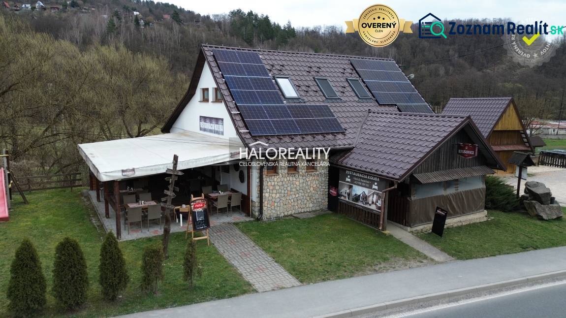 A restaurant in Hnúšťa with outdoor seating and solar panels offers dining spaces.