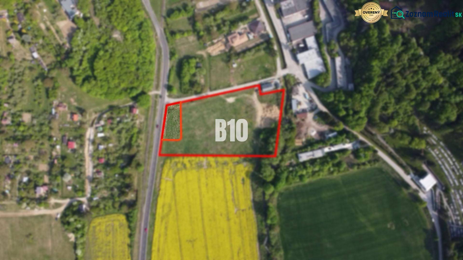 Aerial view of residential plots in Trenčianske Teplice, surrounded by green environment.