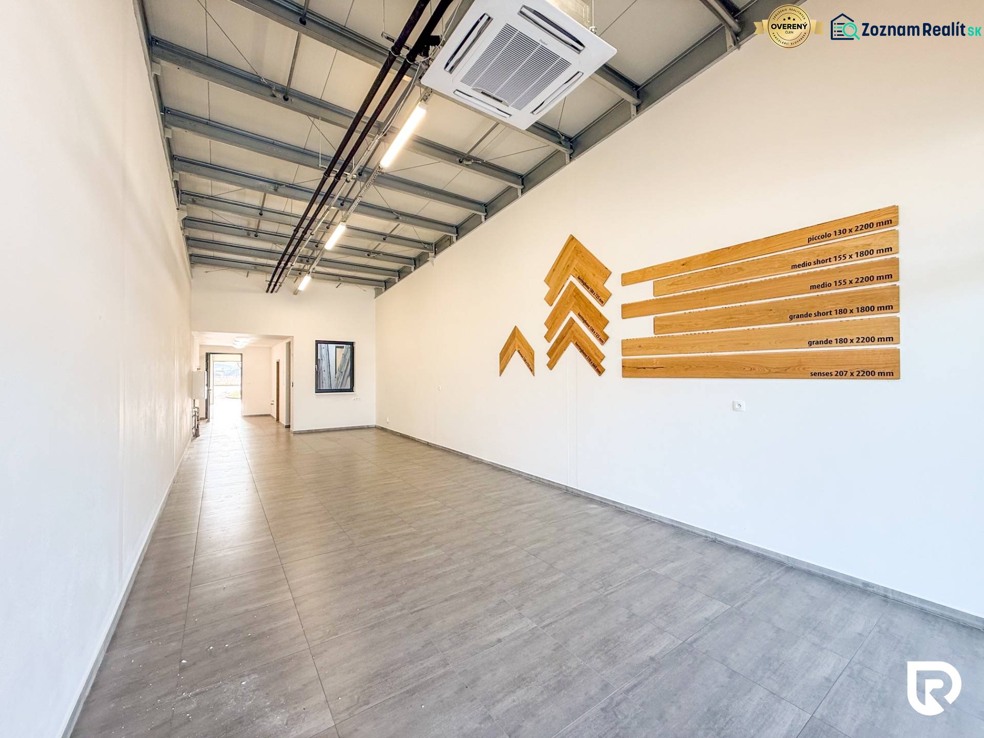 Commercial spaces with wood-patterned flooring and wall decoration.