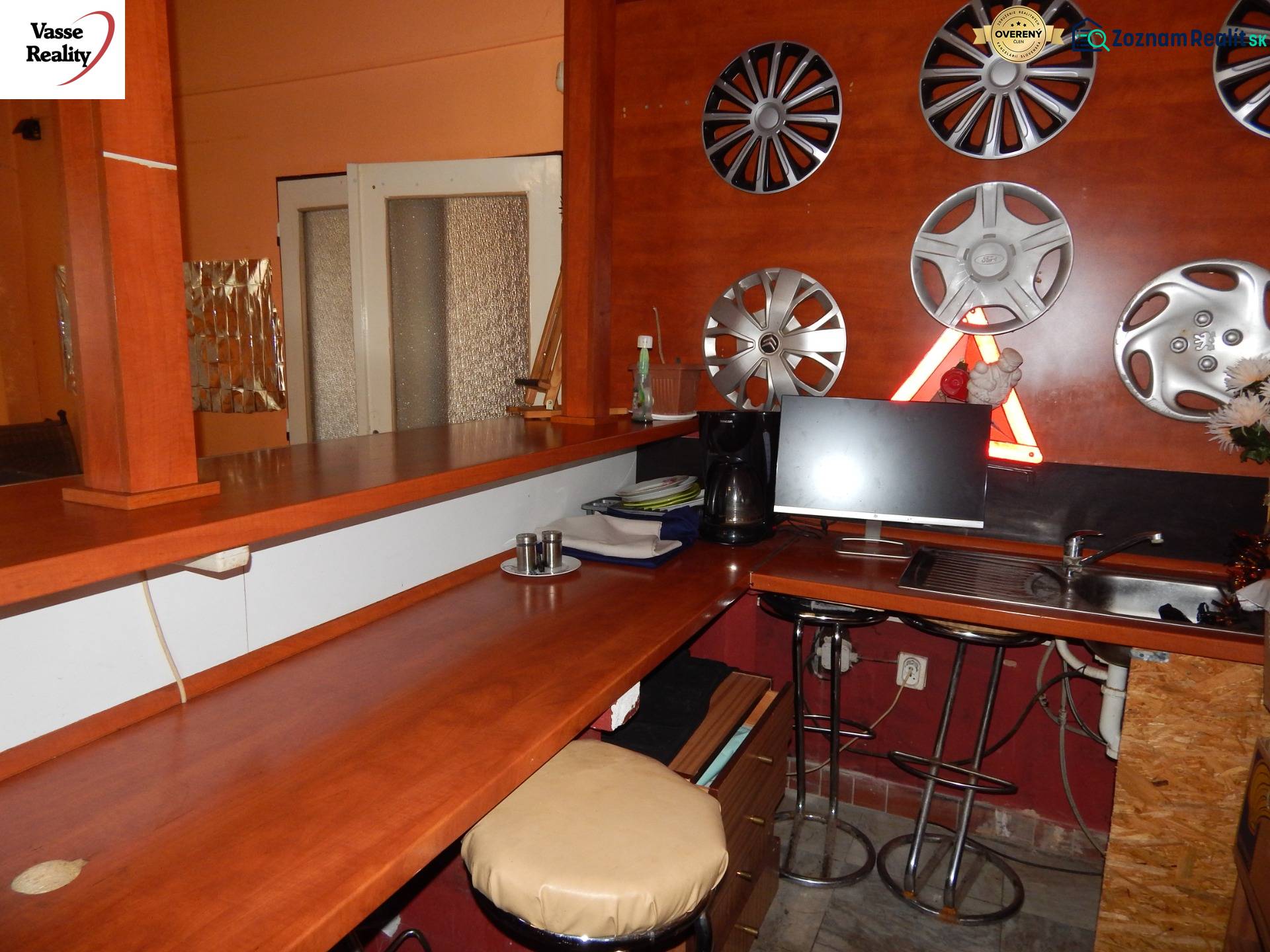 Interior with a bar and hubcap decoration on the wall in gastronomy spaces.
