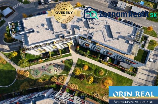 Apartment complex with a playground on Malokrasňanská in Bratislava - Rača, top view.