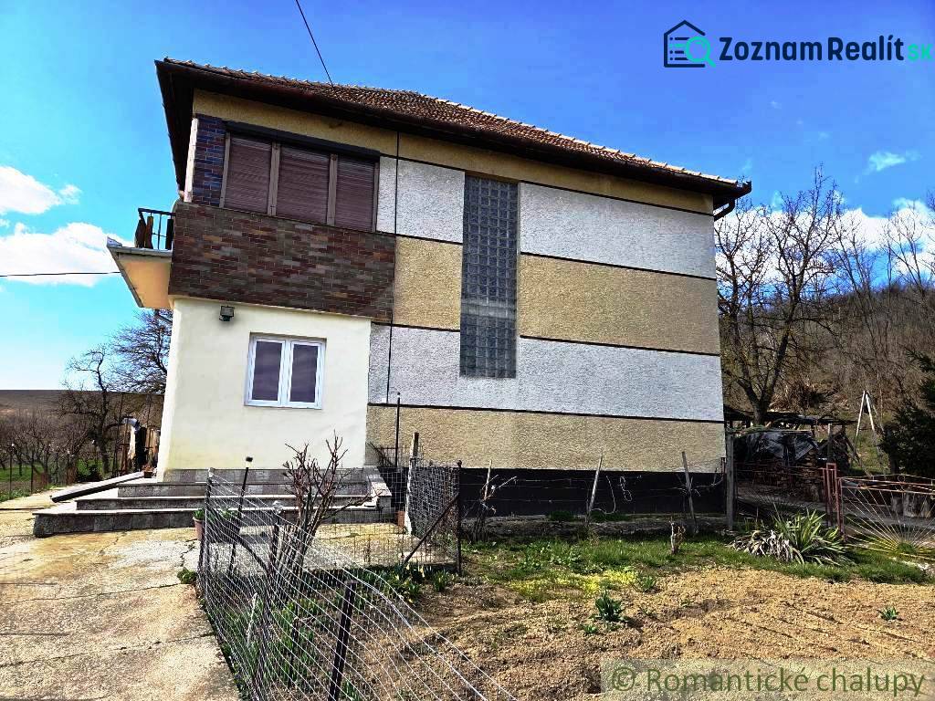 A family house in Kiarov with a balcony and a garden on a visible plot.