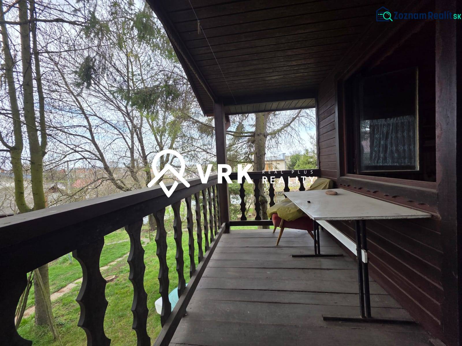 Wooden terrace with a garden view in the location of Bohdanovce for Residential Land.