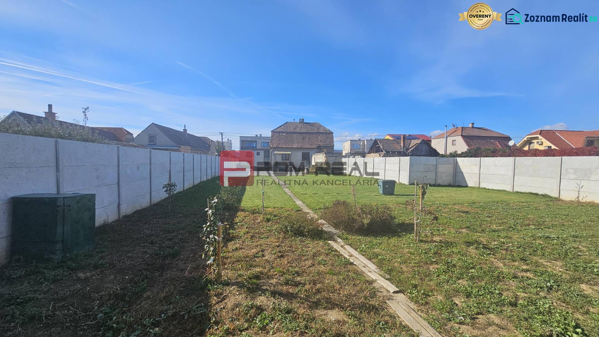 A family house on Chorvátska Street in Slovenský Grob with a large fenced yard.