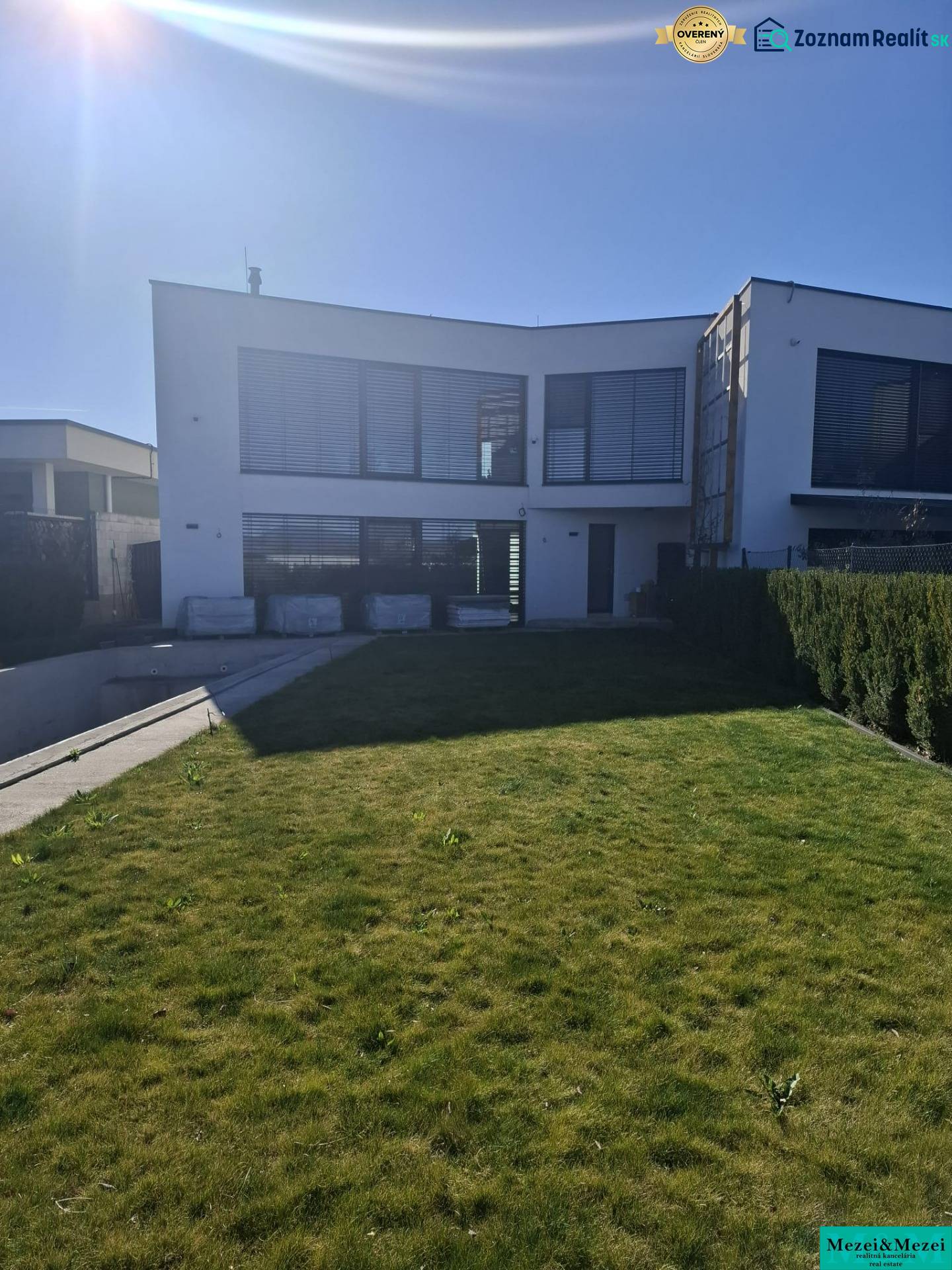 A family house in Zvončín with a spacious lawn and sunny exterior.