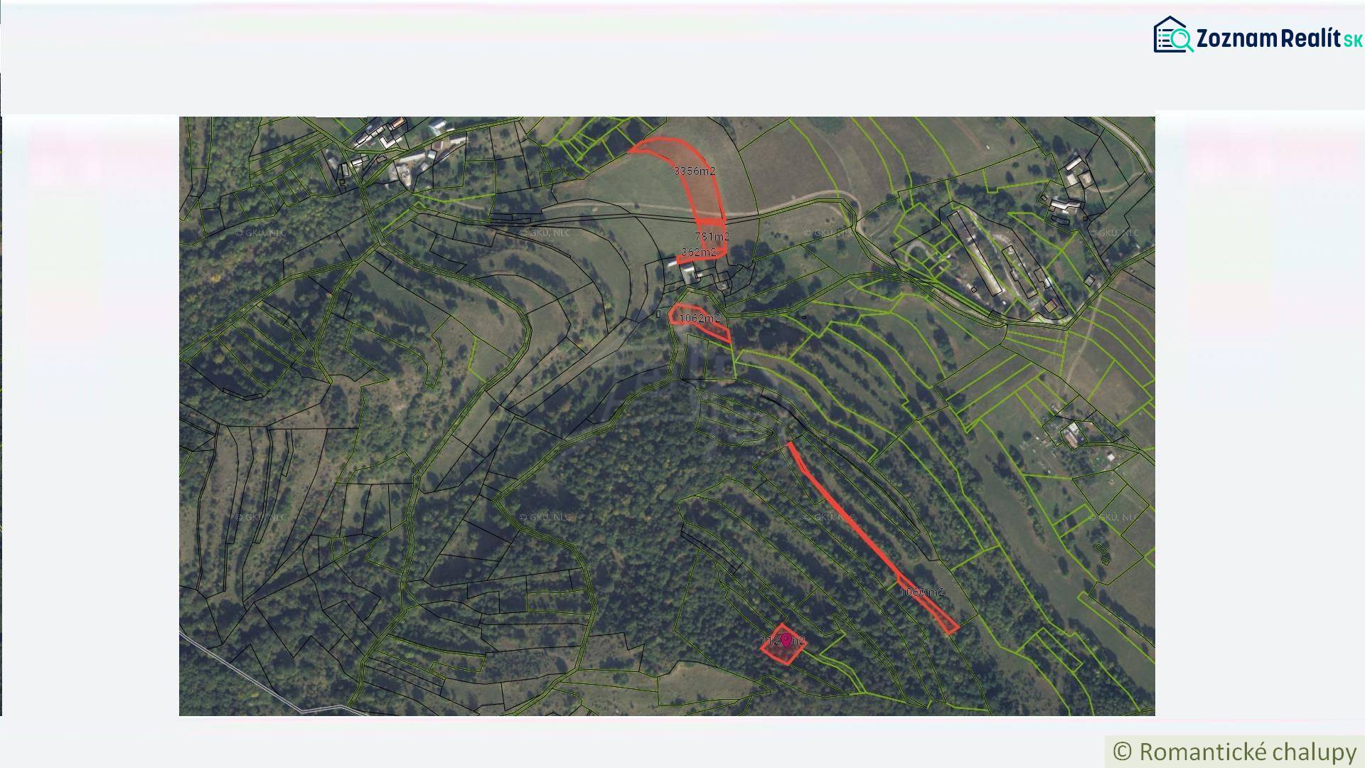 Aerial view of parceled plots for housing in Horný Tisovník with a forested landscape.