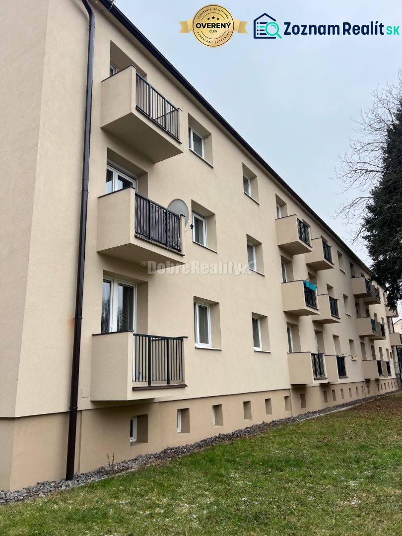 A building with balconies on Svätoplukova Street, Prievidza, offering 2-room apartments.