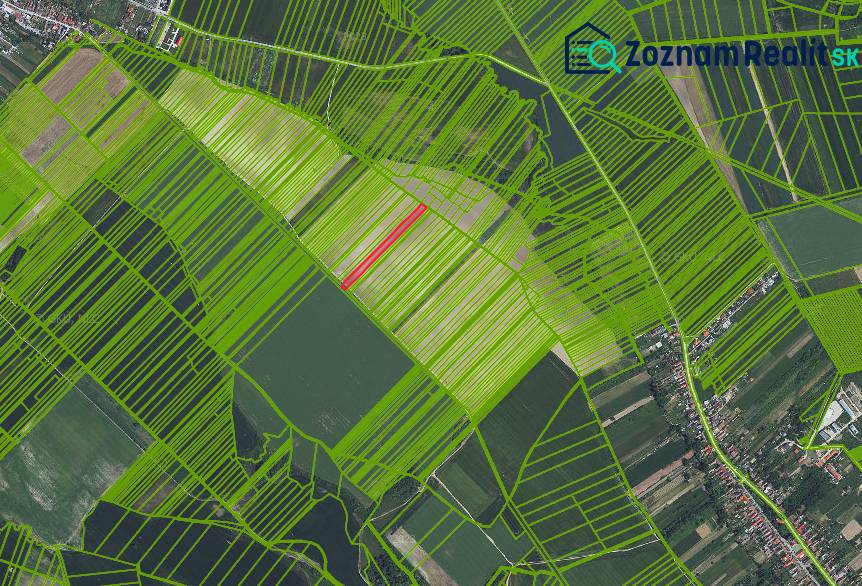 Aerial view of agricultural and forest lands in Častá with map points.