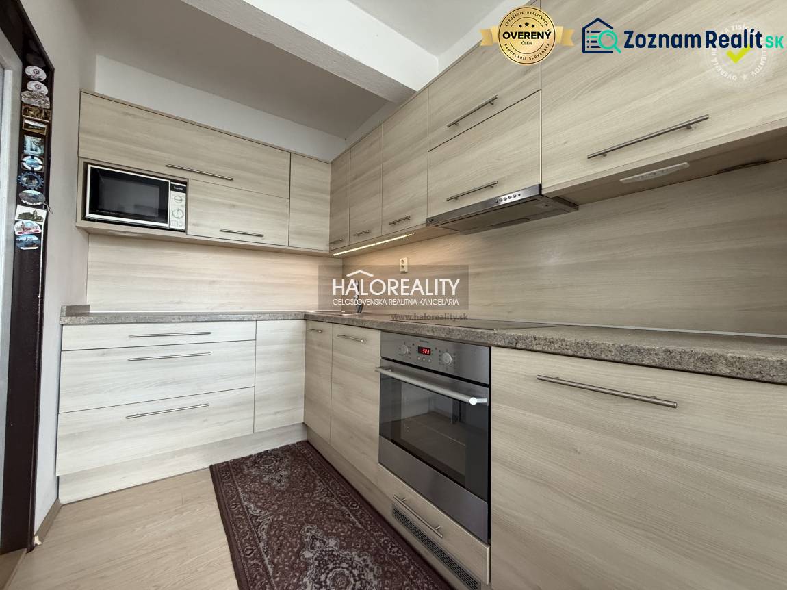 A kitchen in a family house with a wooden decor countertop and floor.