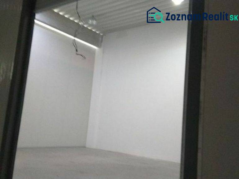 Empty room with white walls in the space of Warehouses and Halls.
