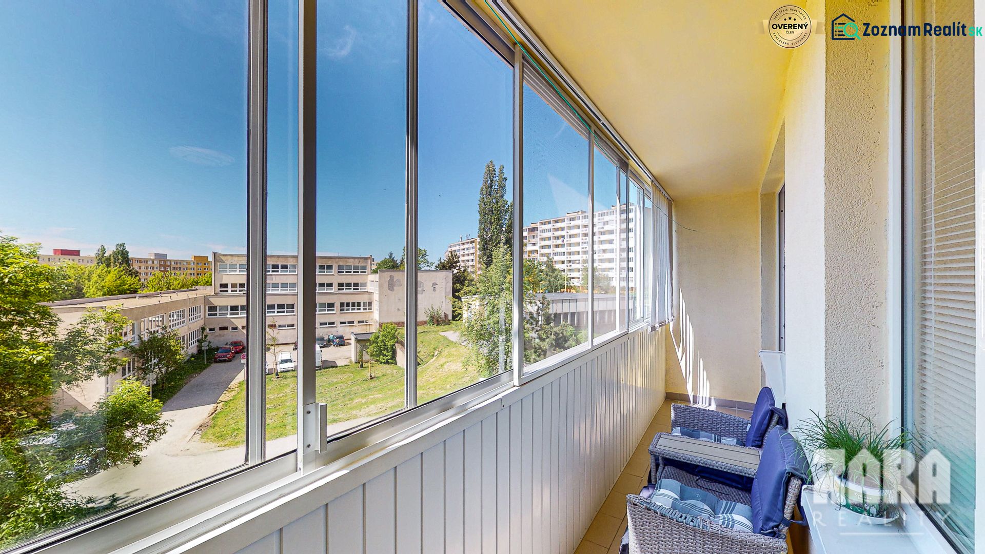 Glazed balcony with a view of Clementisova Street, Košice - Dargovských hrdinov district.