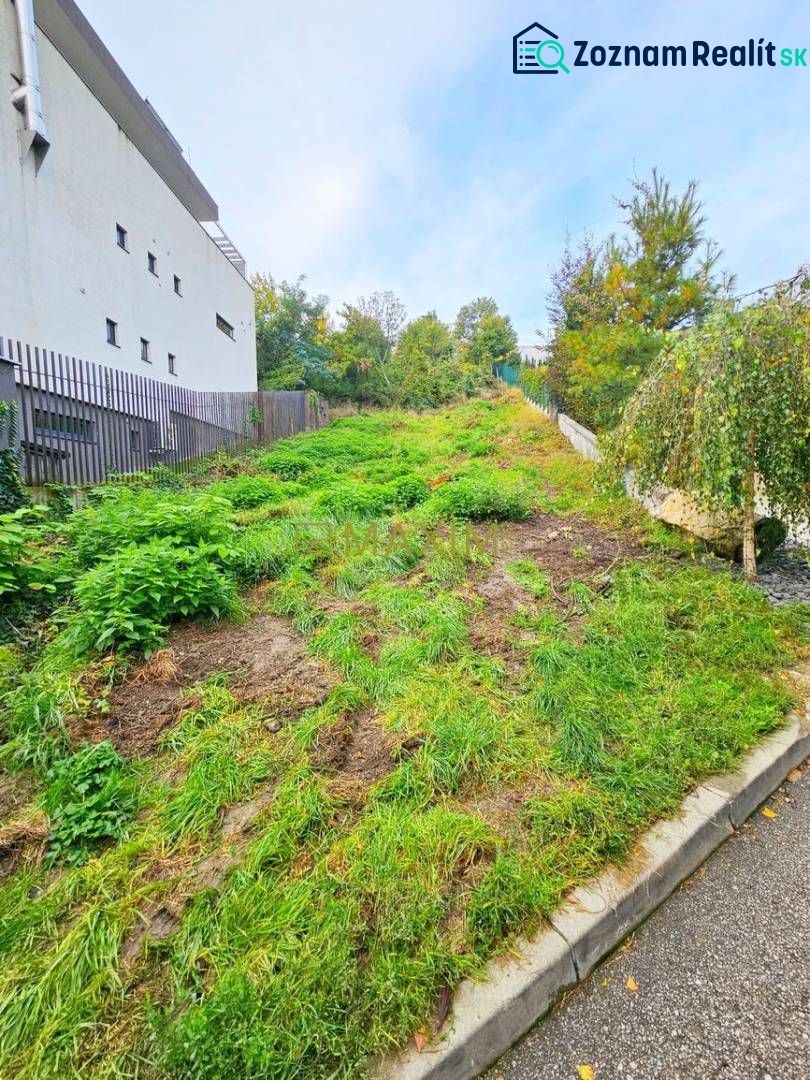Sloped terrain with lush vegetation on Tupého Street in Bratislava (Nové Mesto), Residential land.