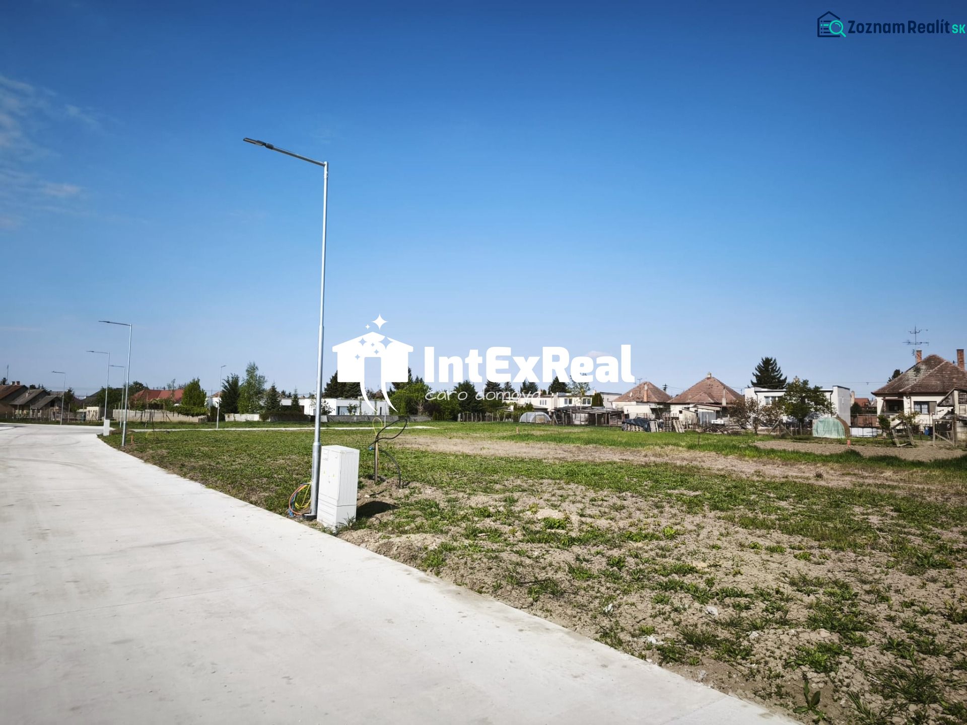 A plot in Čierny Brod suitable for living with a paved road and lighting.