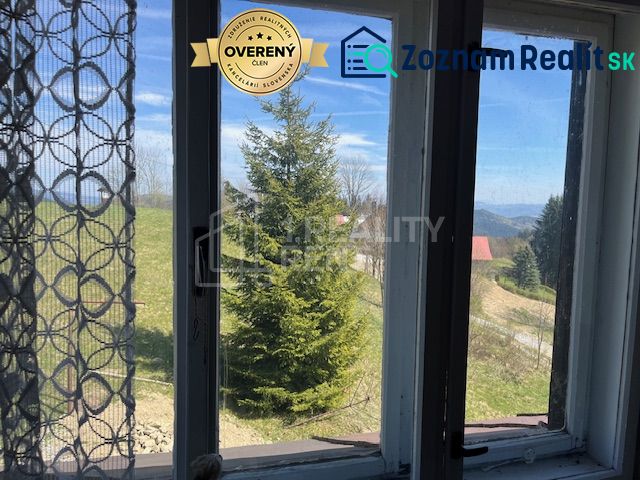 The view from the family house in Korňa with beautiful nature and a clear sky.