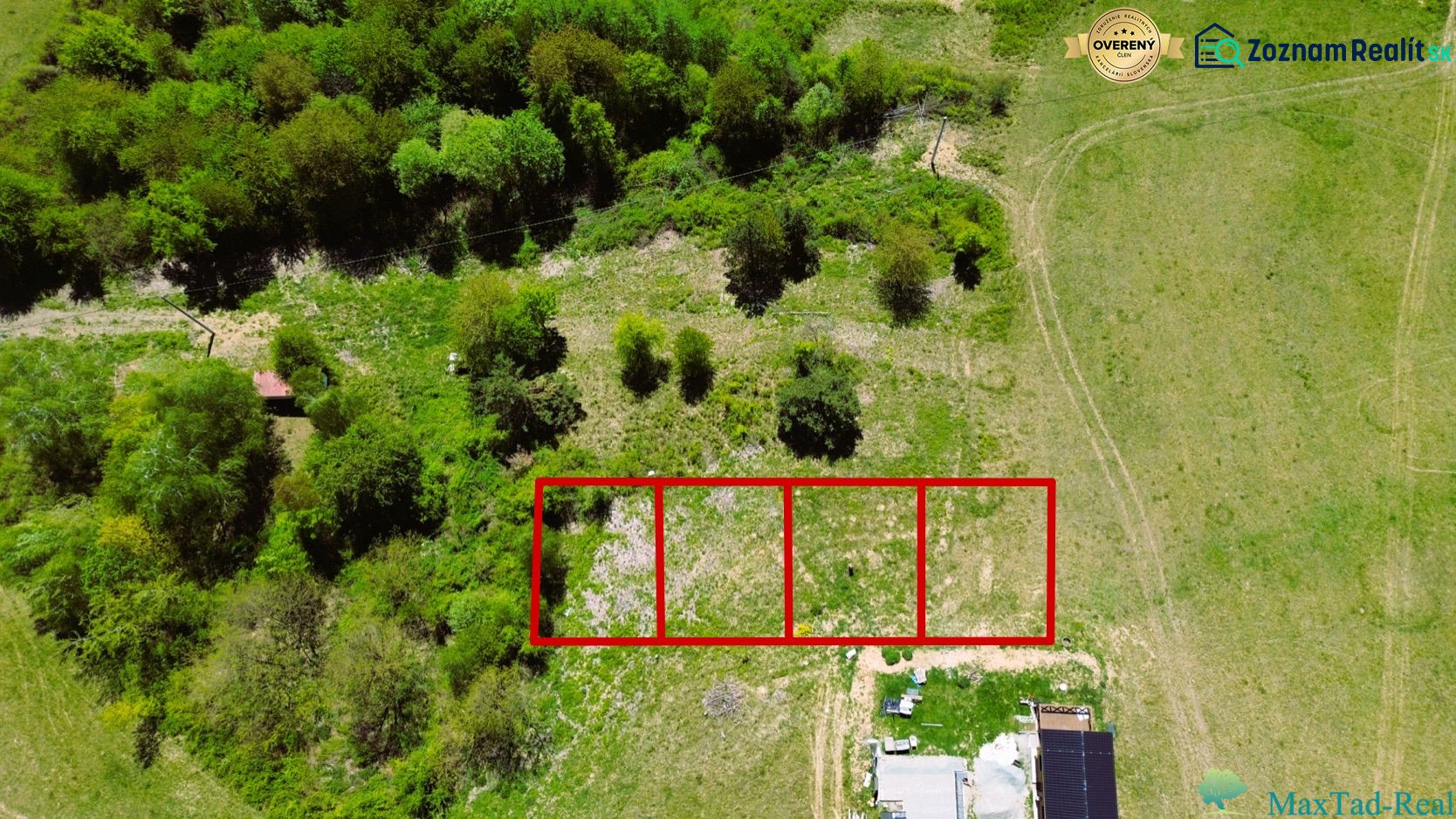 Recreational plots in Nová Kelča, surrounded by greenery, divided by red lines.