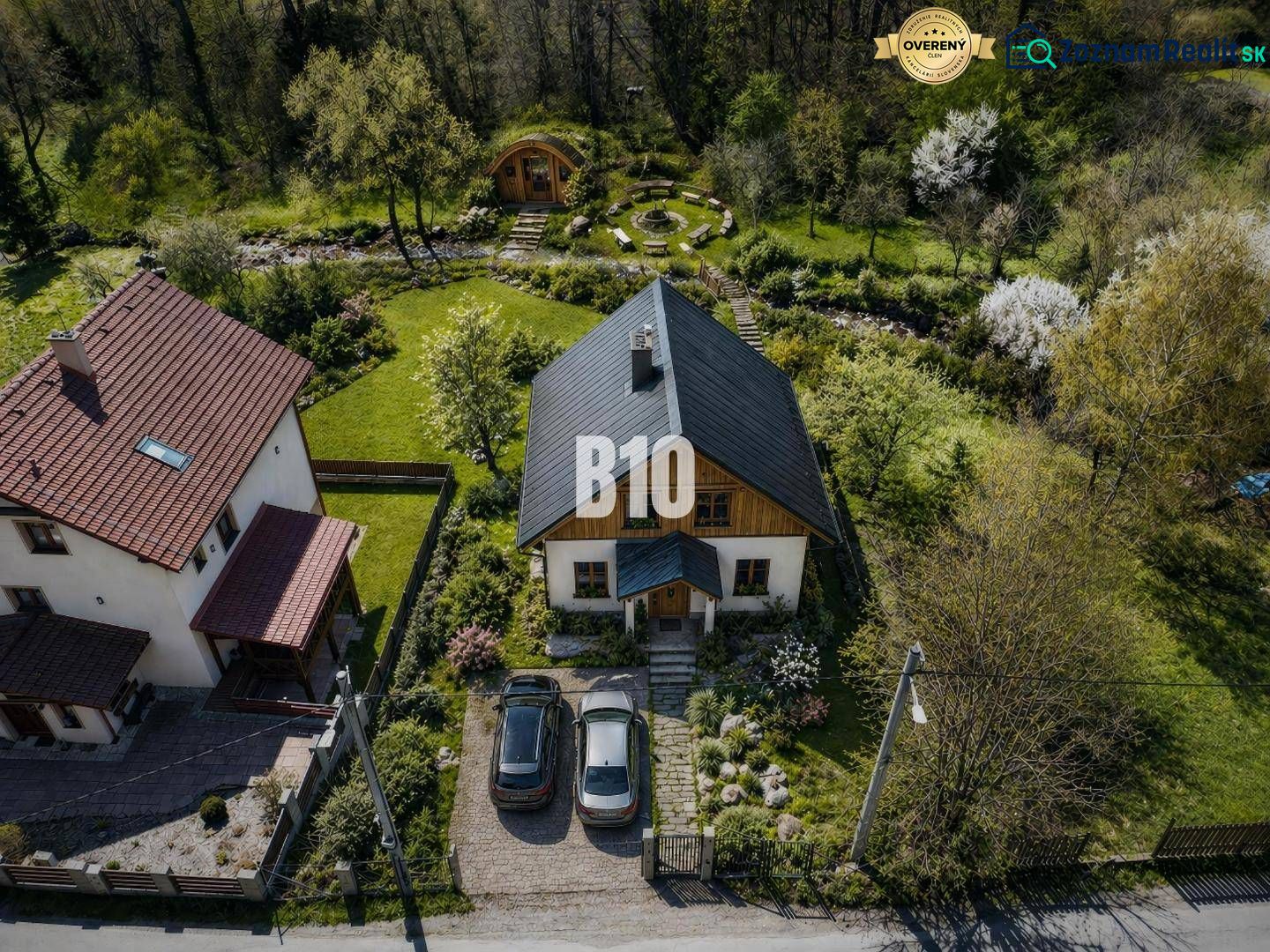 A house on Obrancov Mieru Street in Banská Štiavnica surrounded by a landscaped garden. Land - residential.