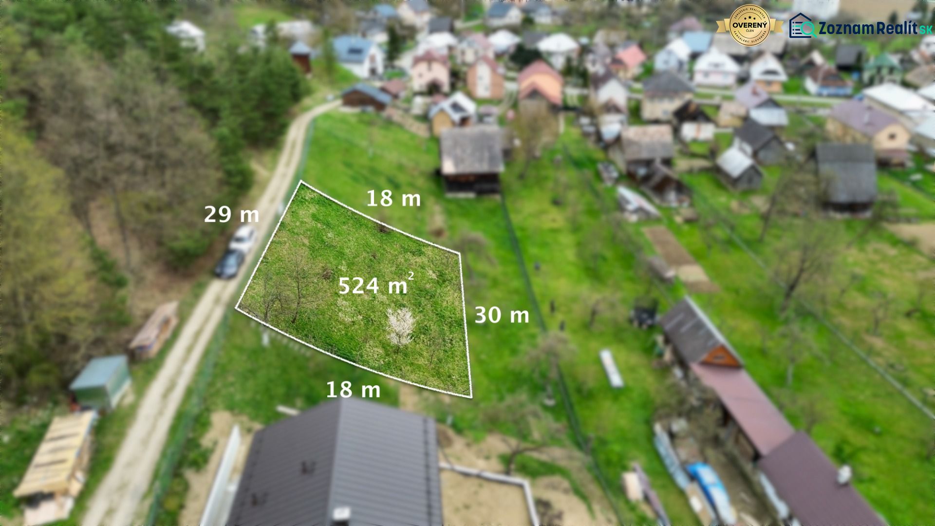 Aerial view of a plot in Rokytov, ideal for living, with a grassy area.