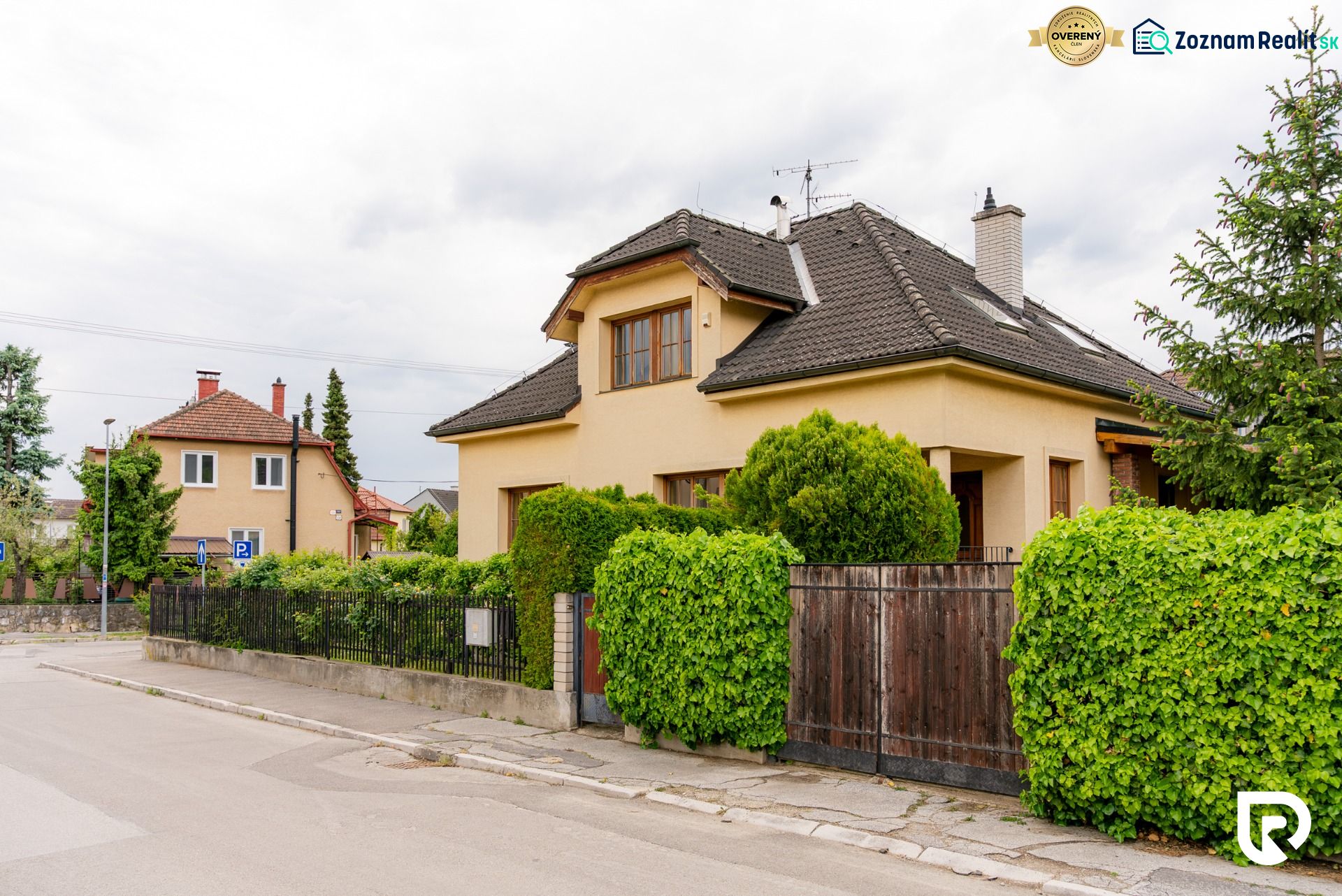 Family house on Kpt. Jaroša in Trenčín with a landscaped garden behind the gate.