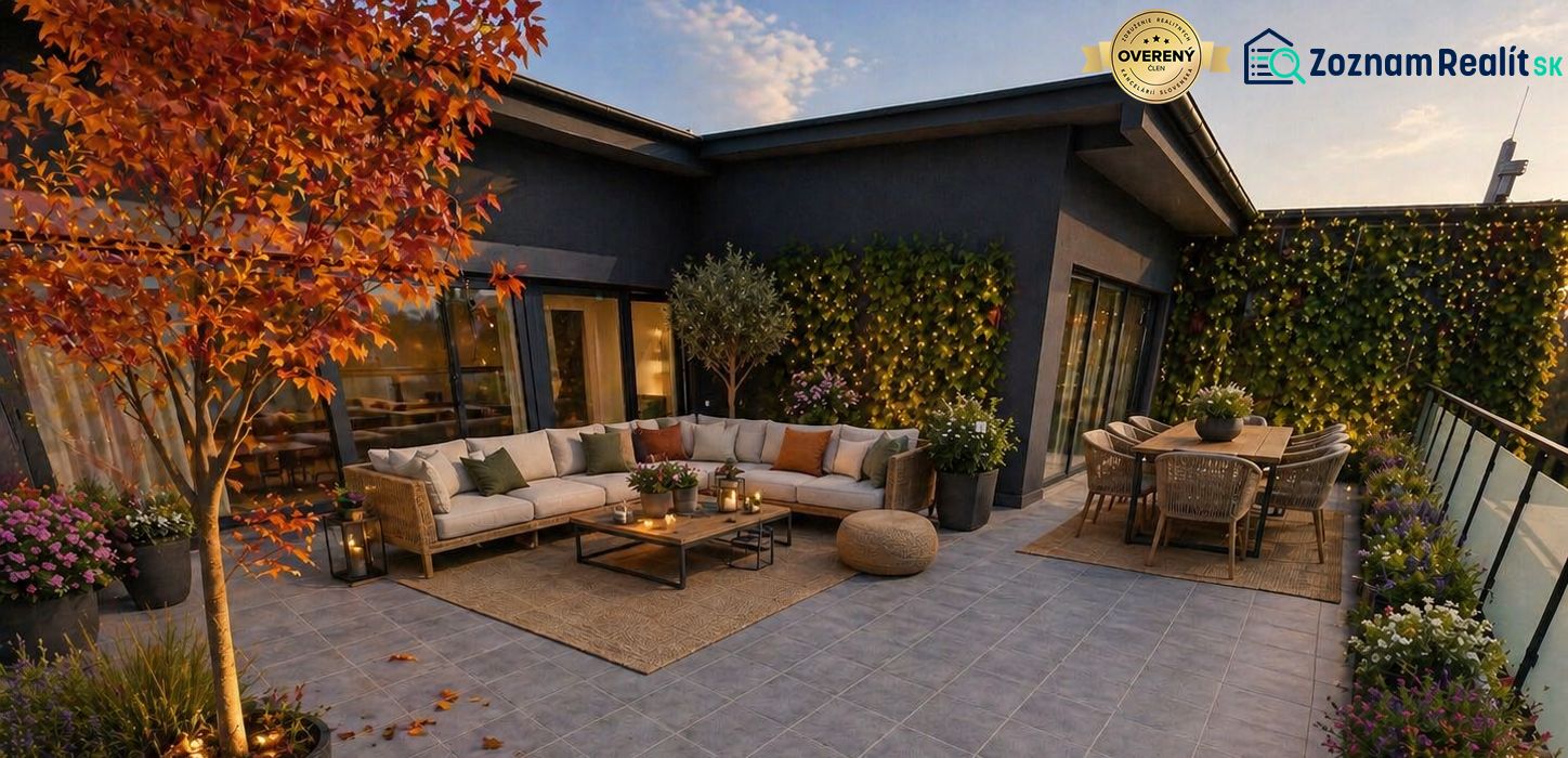 A terrace in a 3-room apartment in Svit with comfortable seating and flowers.