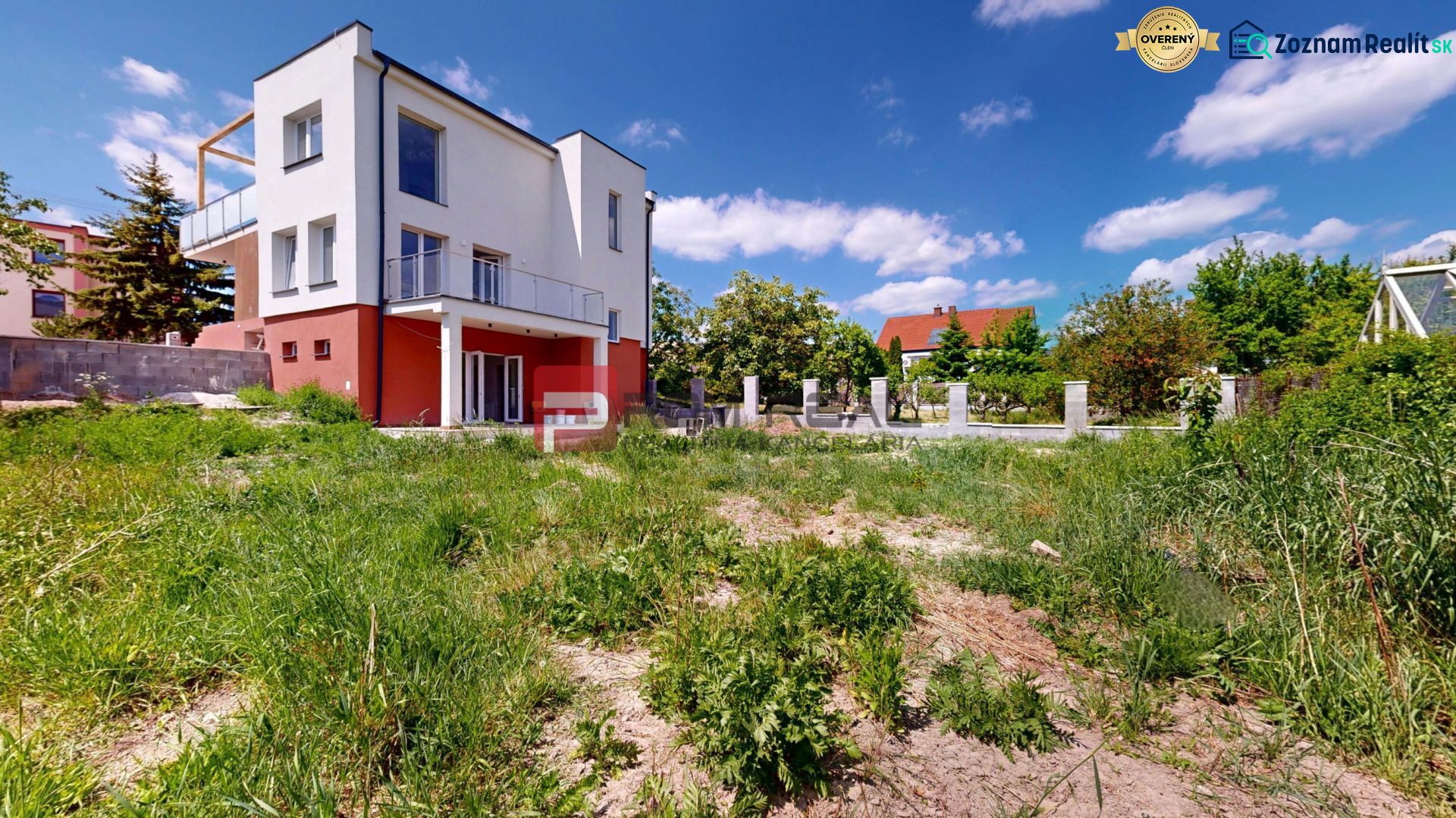 A family house on Sládkovičova Street in Modra is surrounded by a grassy plot.