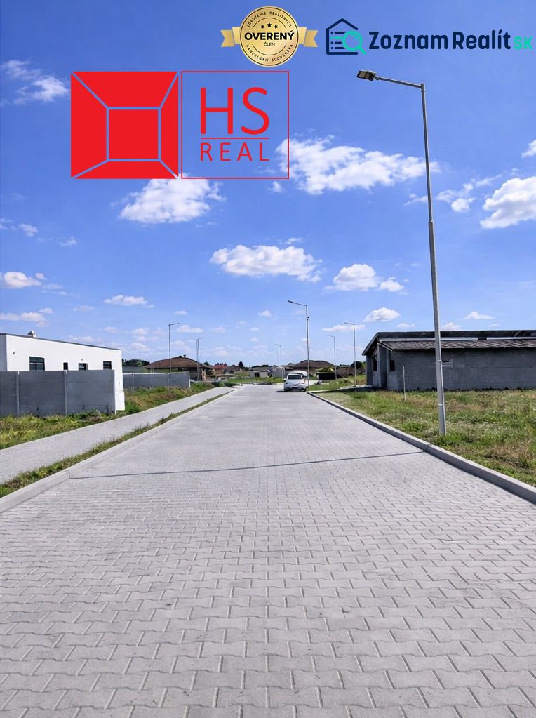A peaceful street with new residential buildings in Dvory nad Žitavou.