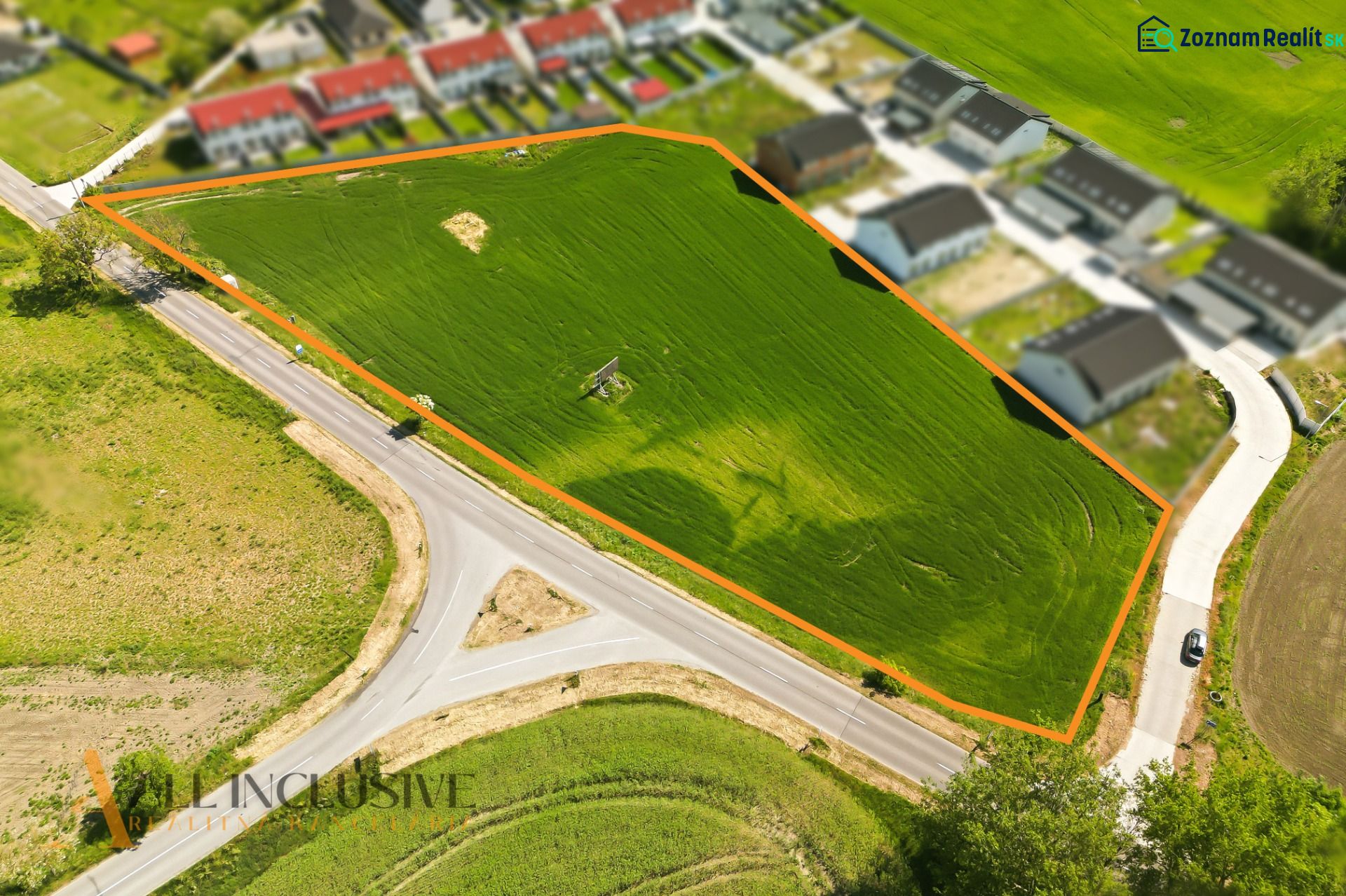 A view of a residential plot in Lehnice, surrounded by roads and green areas.
