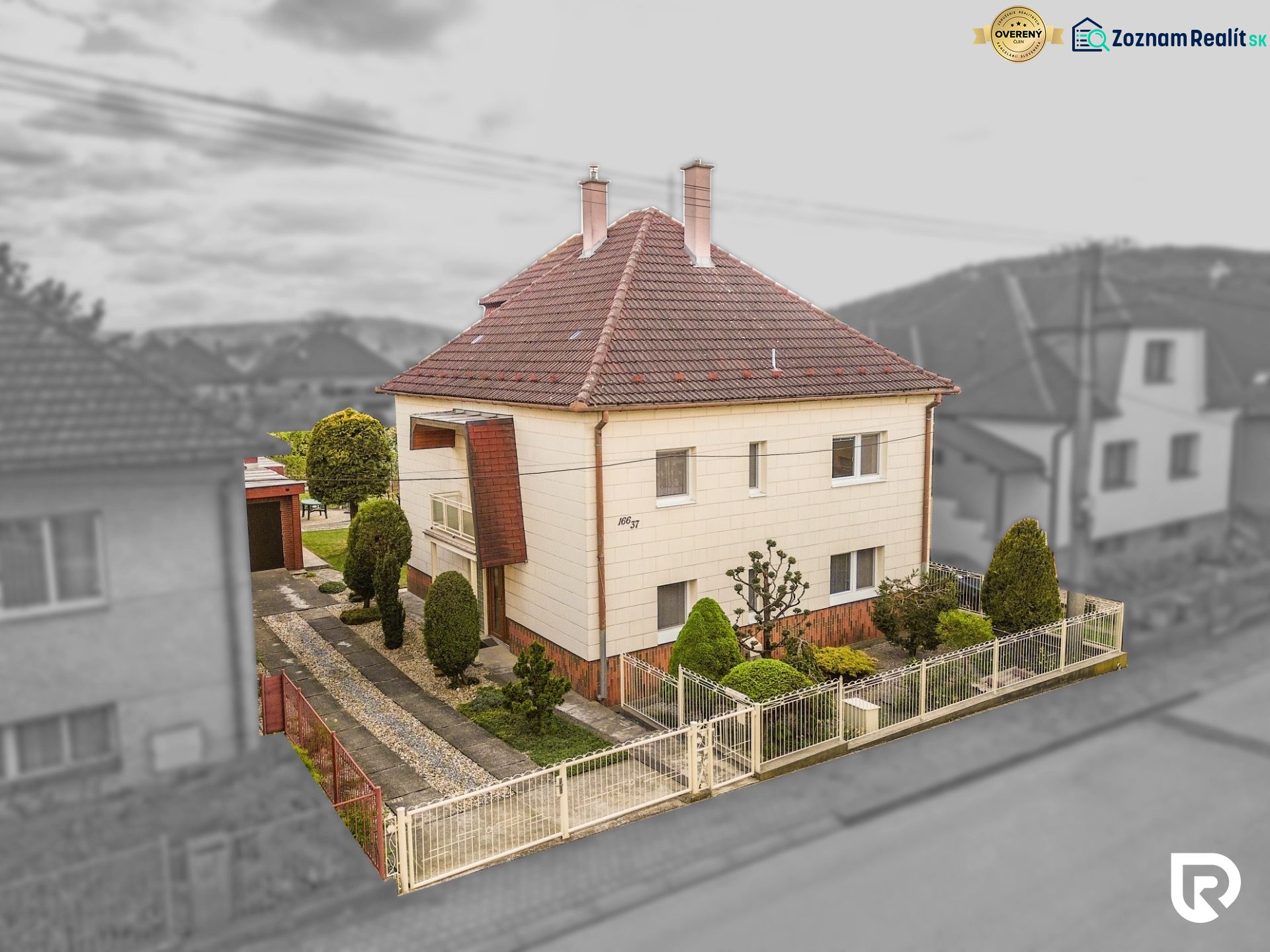 A family house on Niva Street in Trenčín with a small garden and a fence.