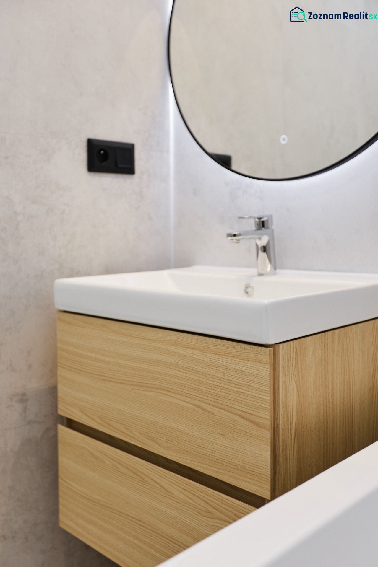 Bathroom cabinet with sink and mirror in a 4-room apartment.
