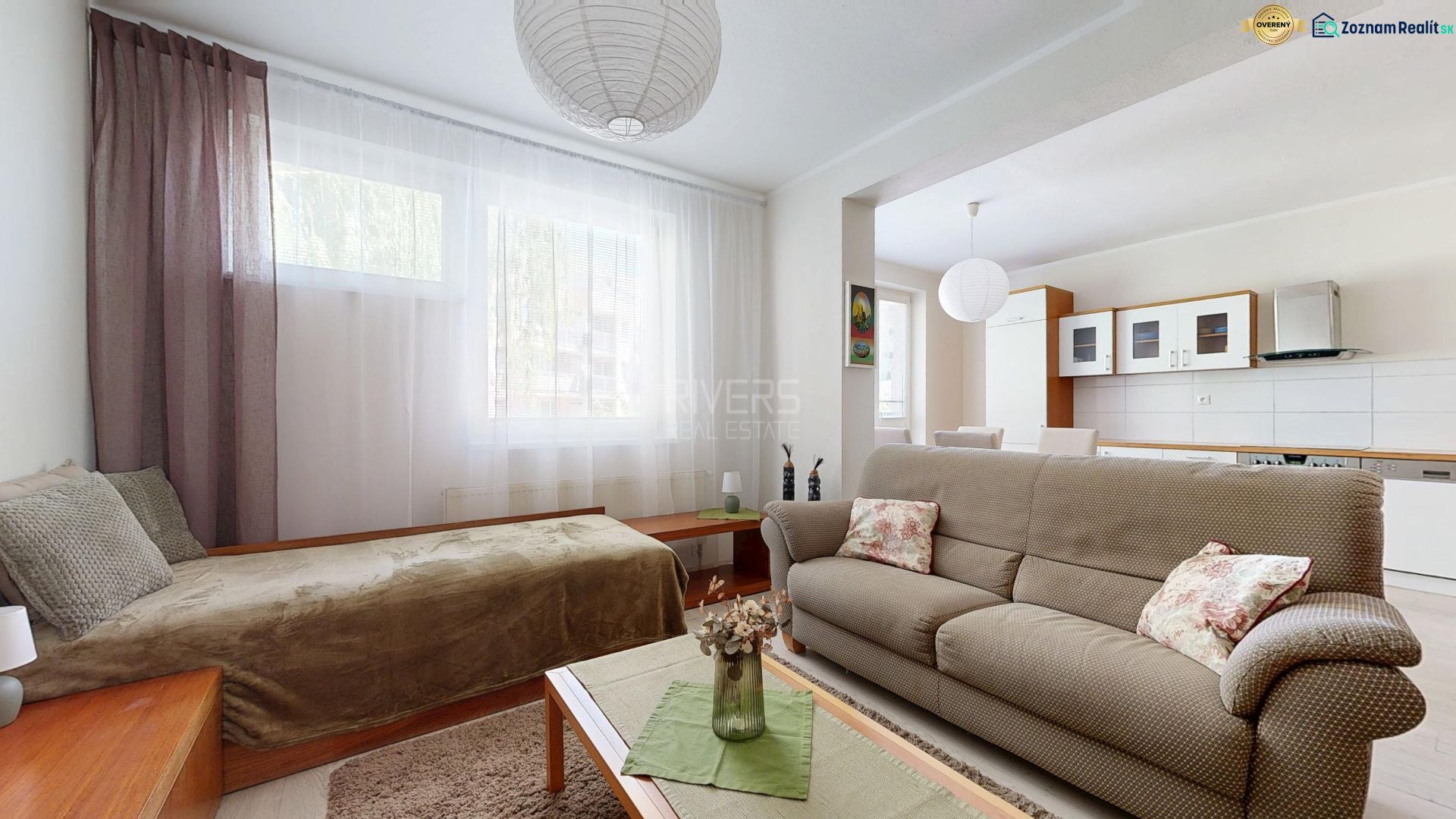Living room in a 3-room apartment with a sofa set, light, and spaciousness.