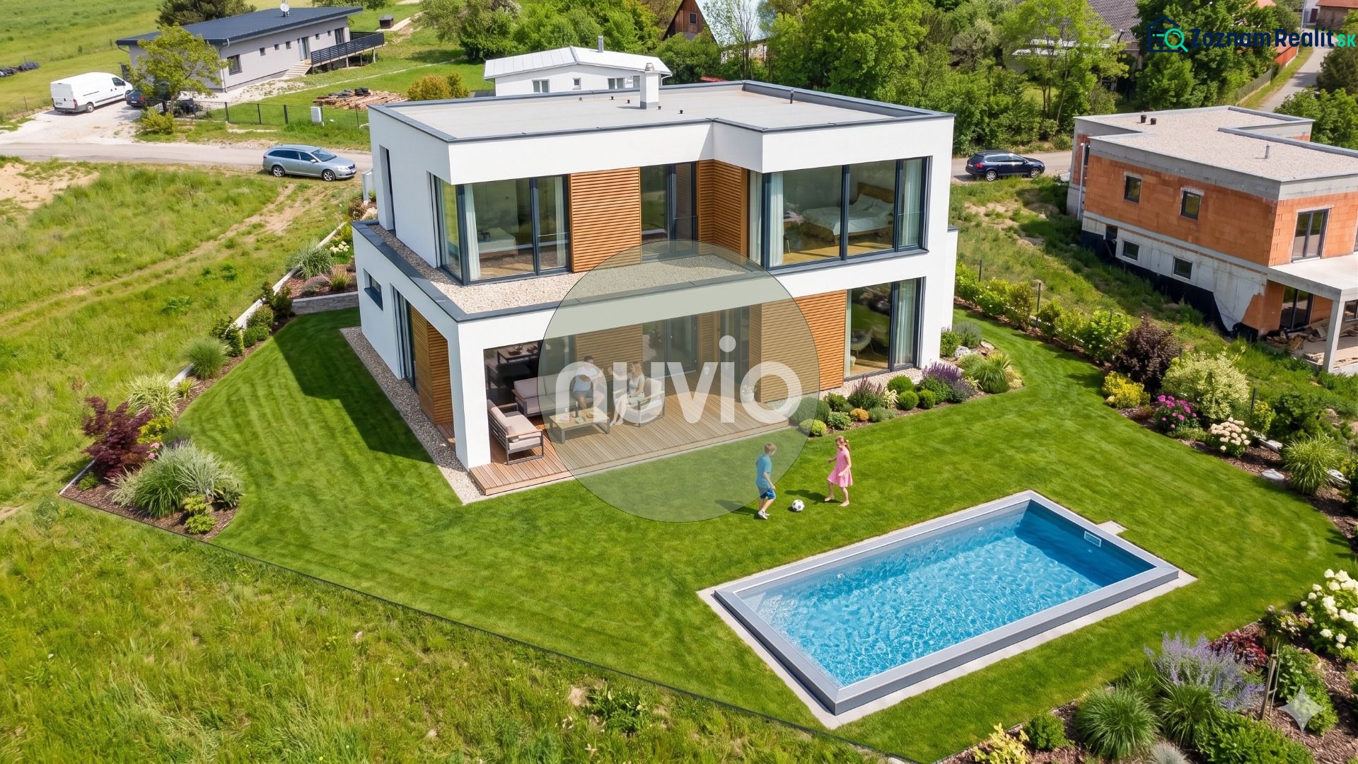 A modern house with a pool and garden in Turčianske Jaseno on a residential plot.