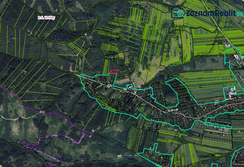 Aerial view of agricultural and forest lands around the town of Vrútky.