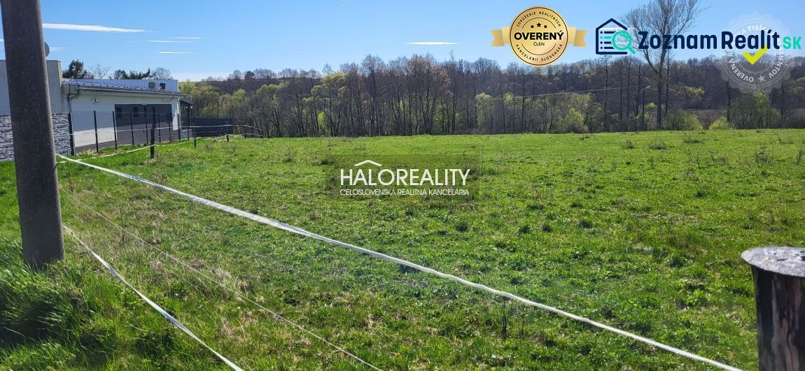 Land - housing in Lutila: extensive grassy areas surrounded by trees and fencing.