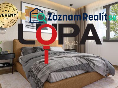 A modern bedroom in a family house with a comfortable box spring bed and decorative elements.